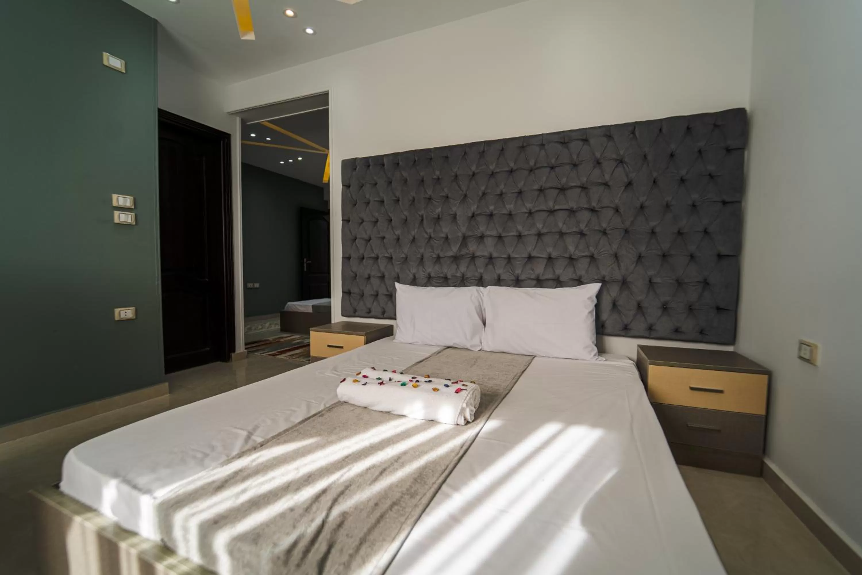 Bed in Gardenia Inn Hotel