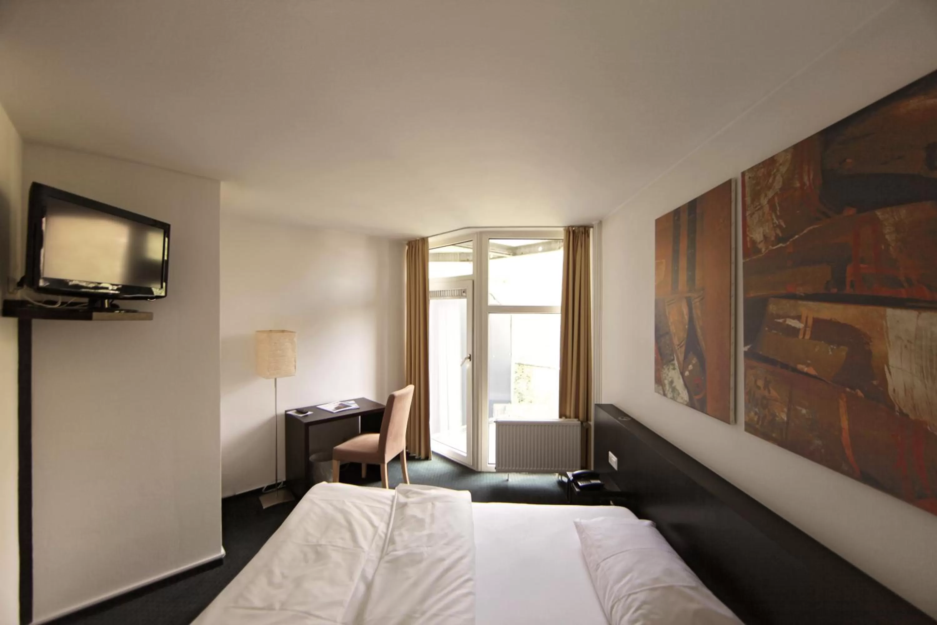 Photo of the whole room, Bed in Wald & Golfhotel Lottental