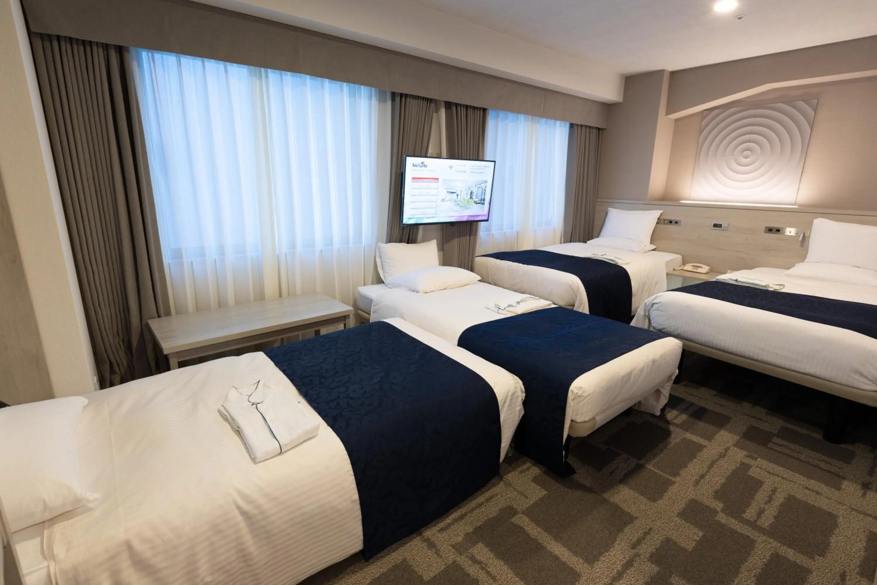 Bed in Hotel Rose Garden Shinjuku