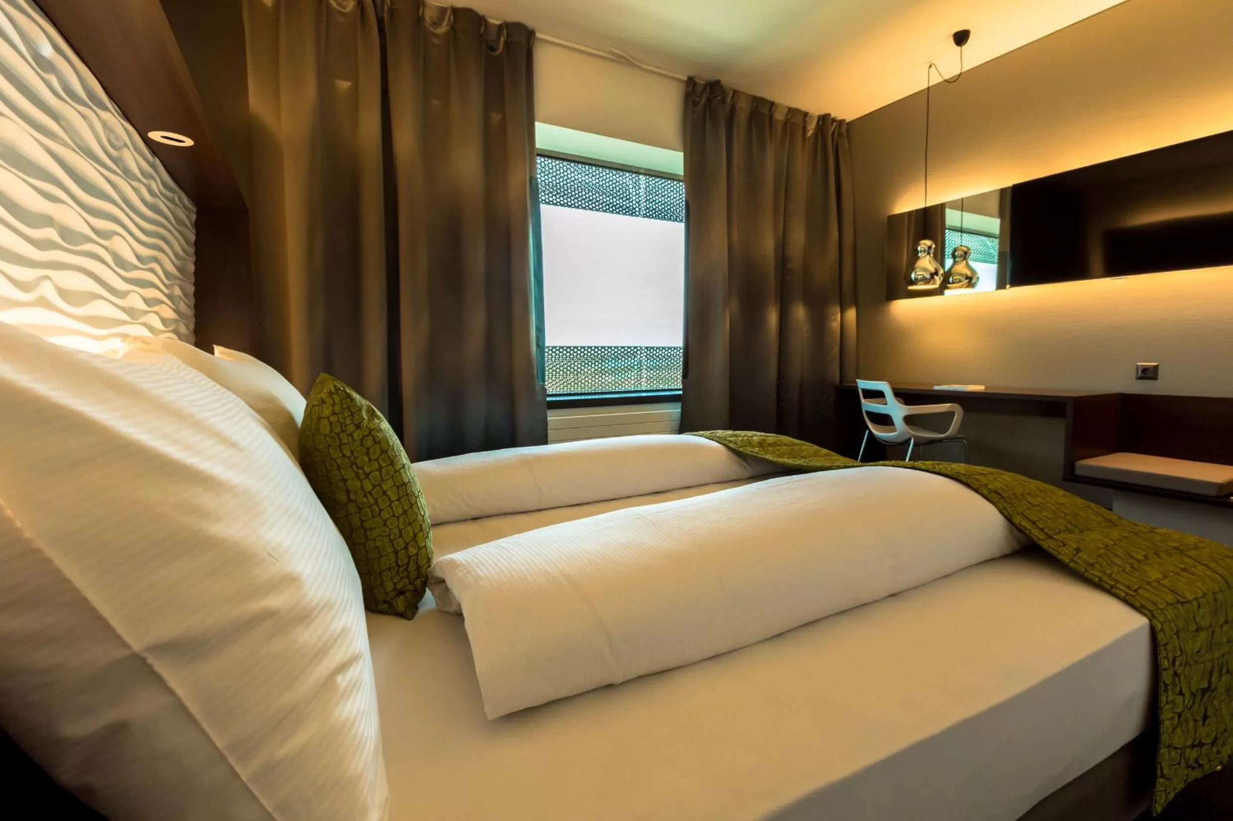 Bed in Airport Hotel Basel - Convenient & Friendly