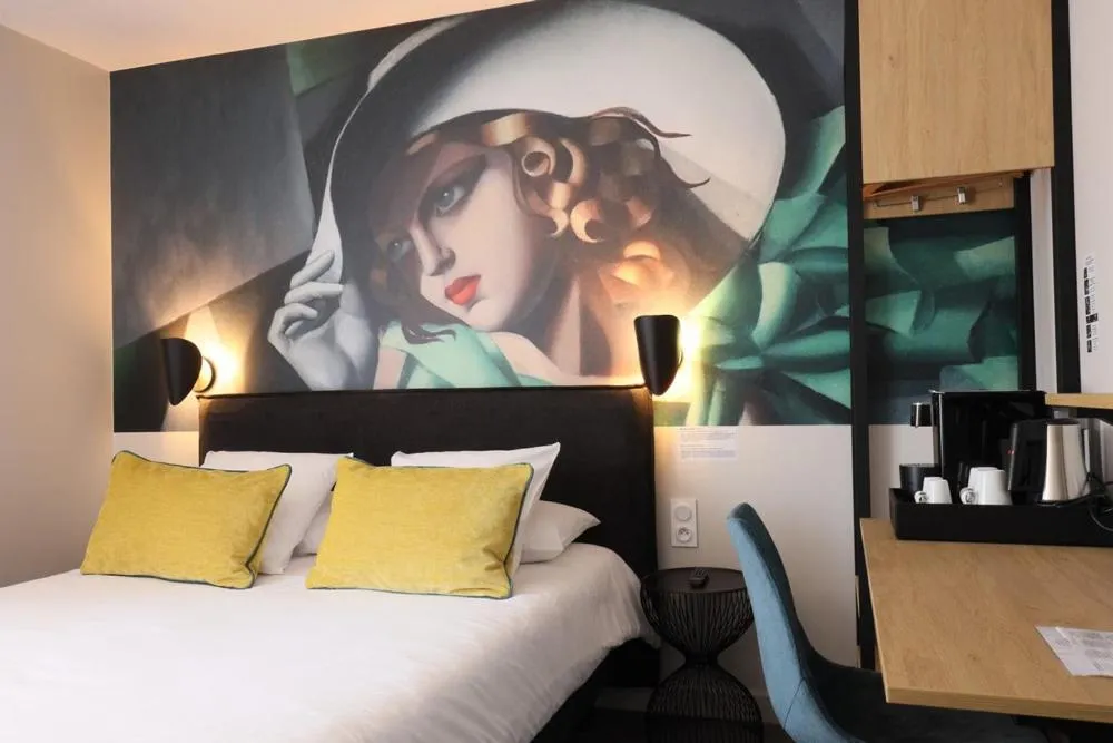 Bed in Hôtel la Capelle Millau