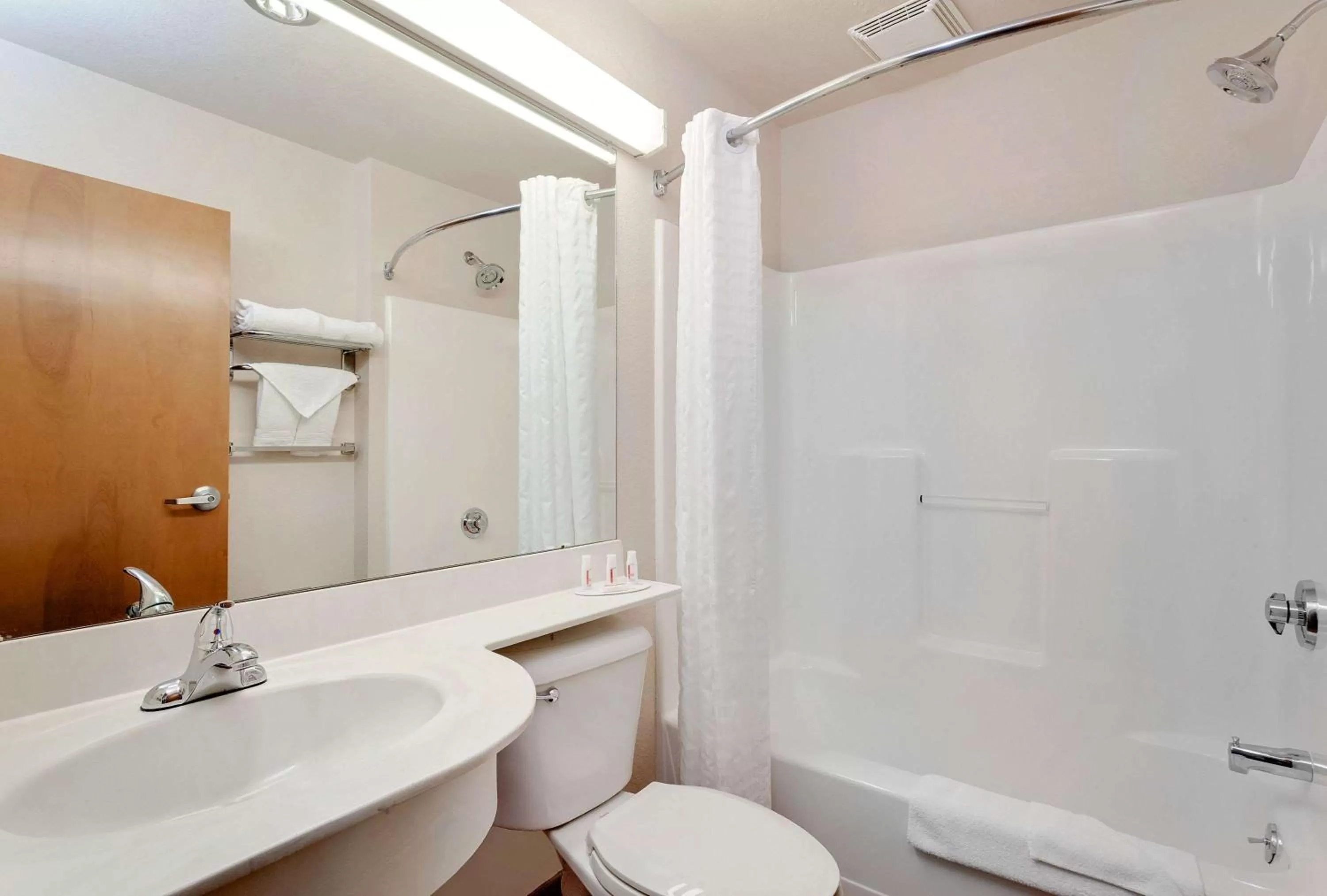 Bathroom in Microtel Inn & Suites by Wyndham Wellsville