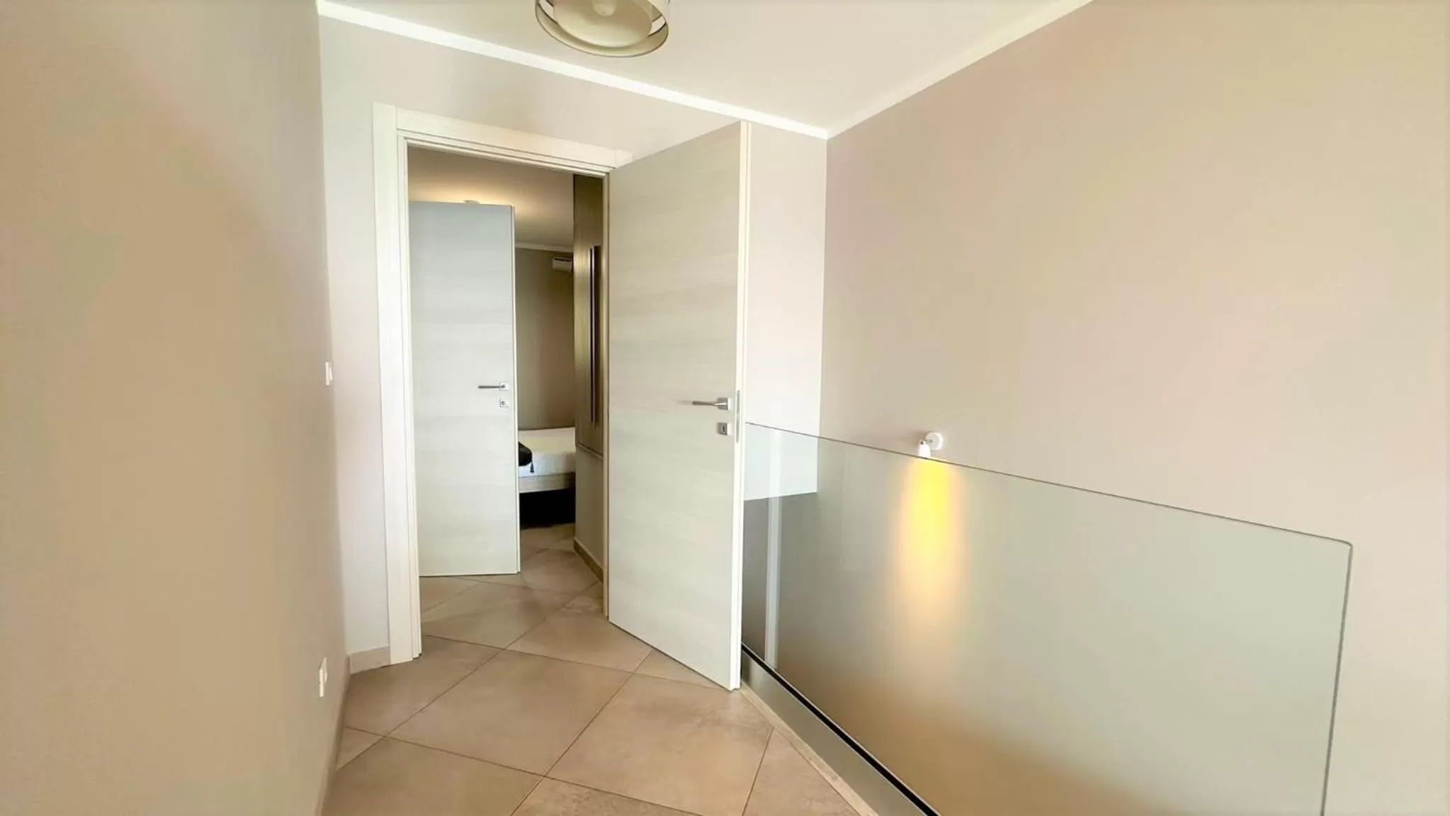 Living room, Bathroom in LE MIDI 8 by ESTATES CANNES