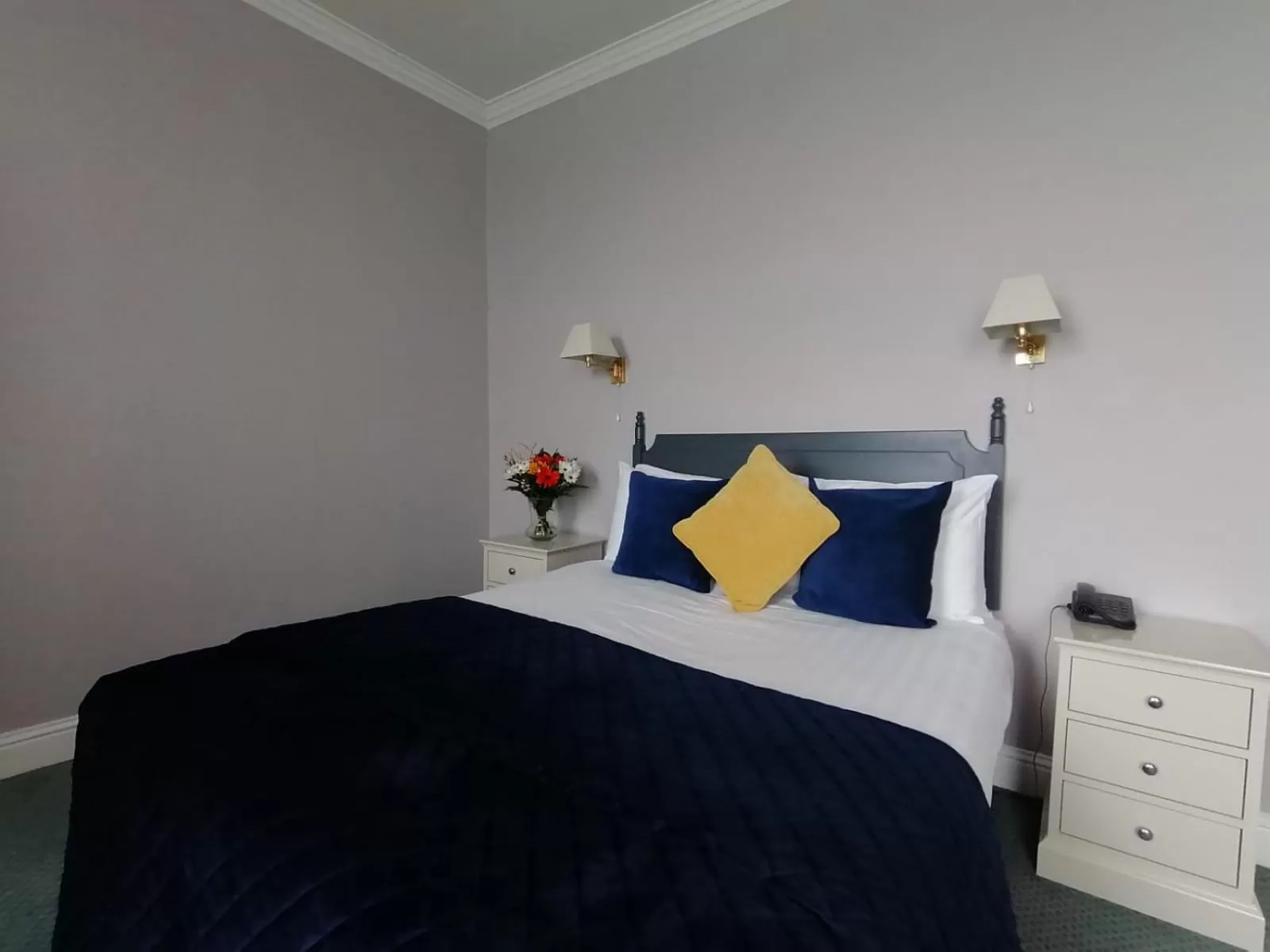 Bed in Commodore Hotel