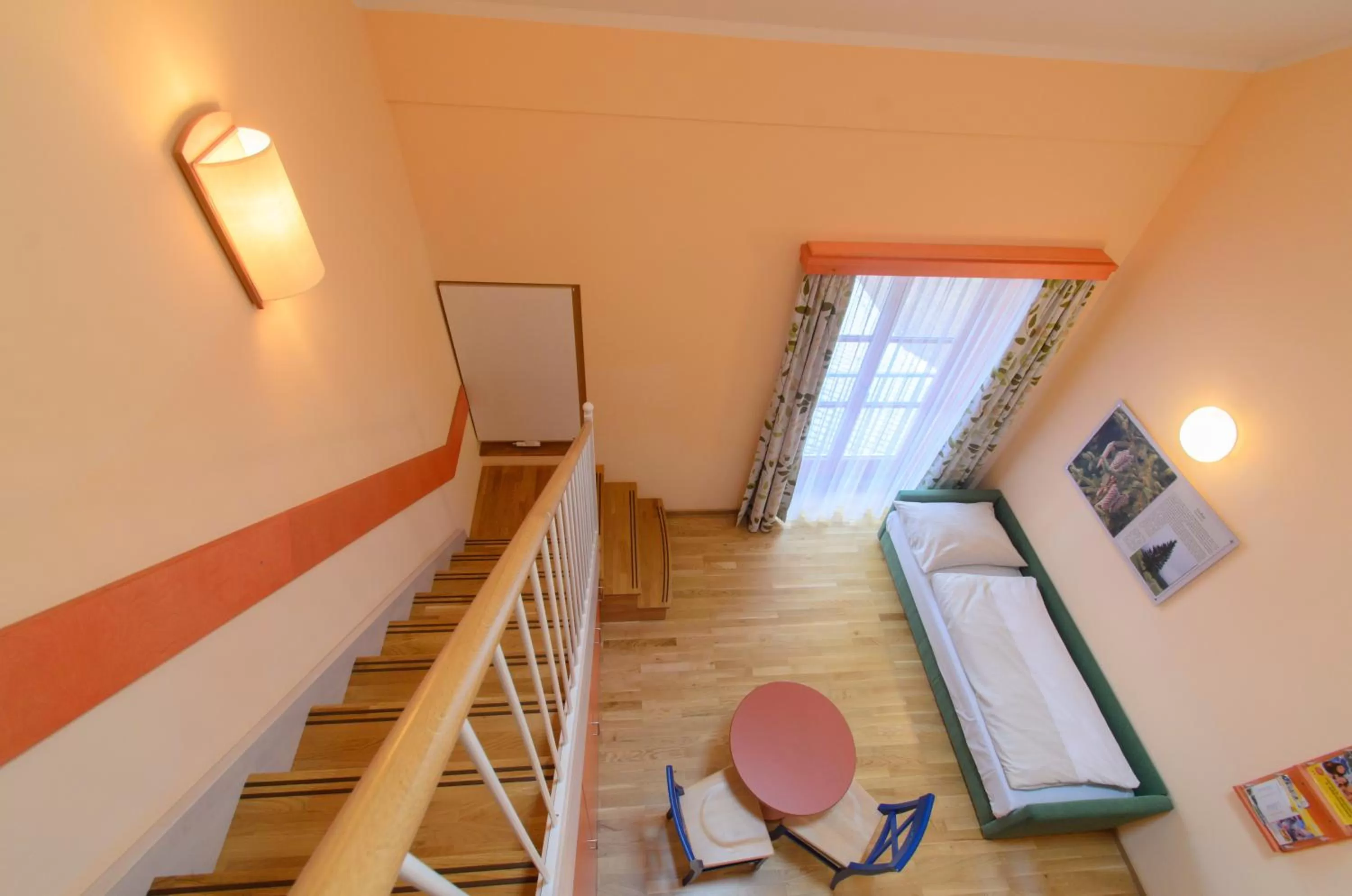 Photo of the whole room, Seating Area in JUFA Hotel Nockberge