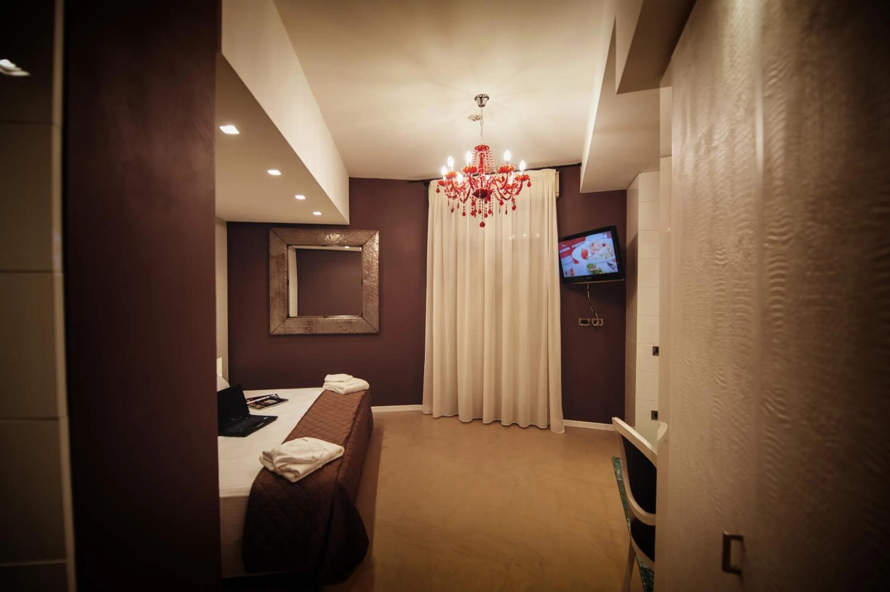 Bed in Gran Paradiso Hotel Spa