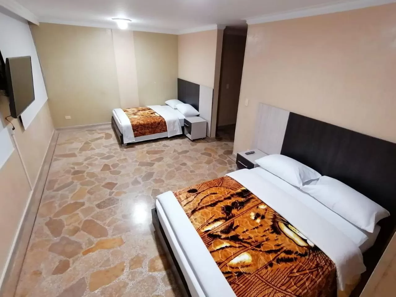 Bed in HOTEL GOLDEN SUITE