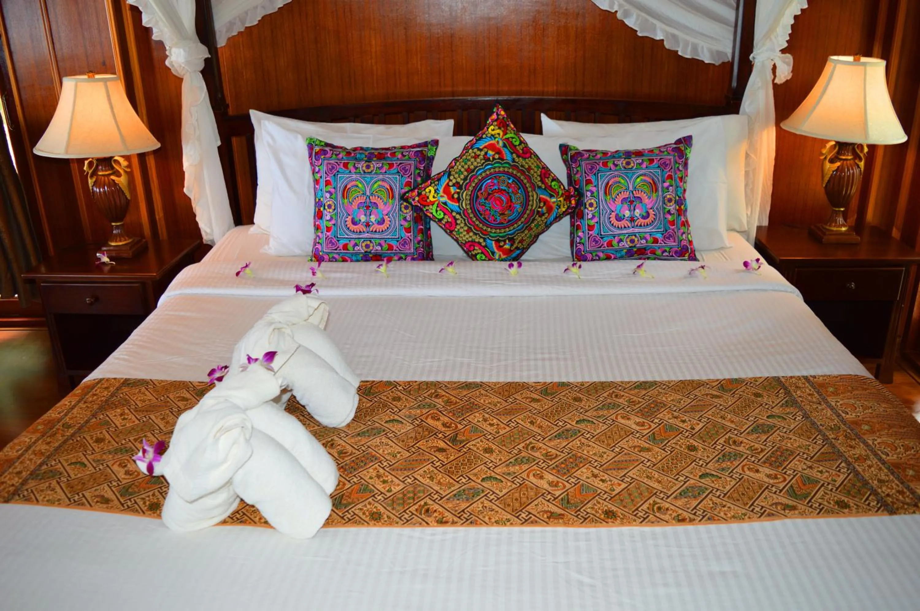 Bed in Sayang Beach Resort Koh Lanta