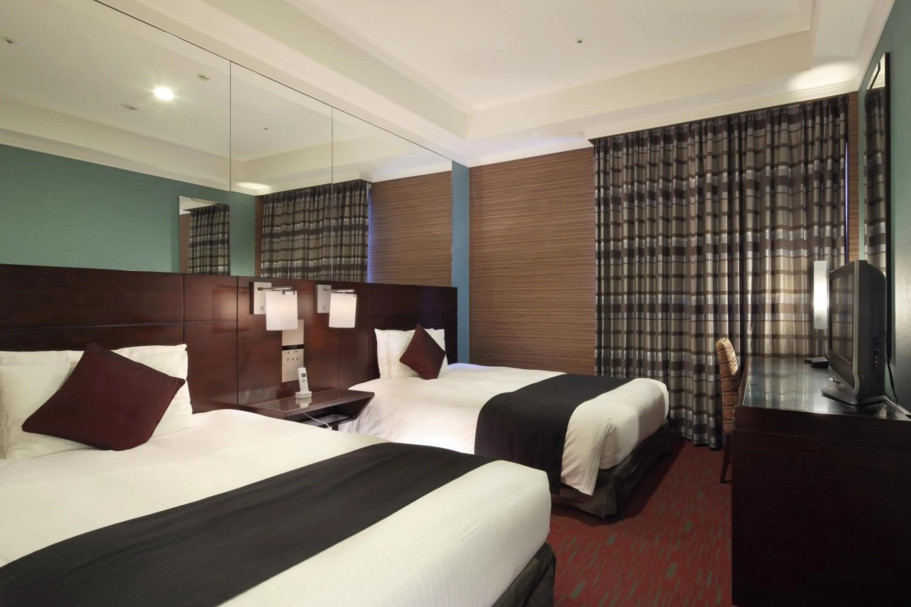 Bed in Hotel Trusty Tokyo Bayside