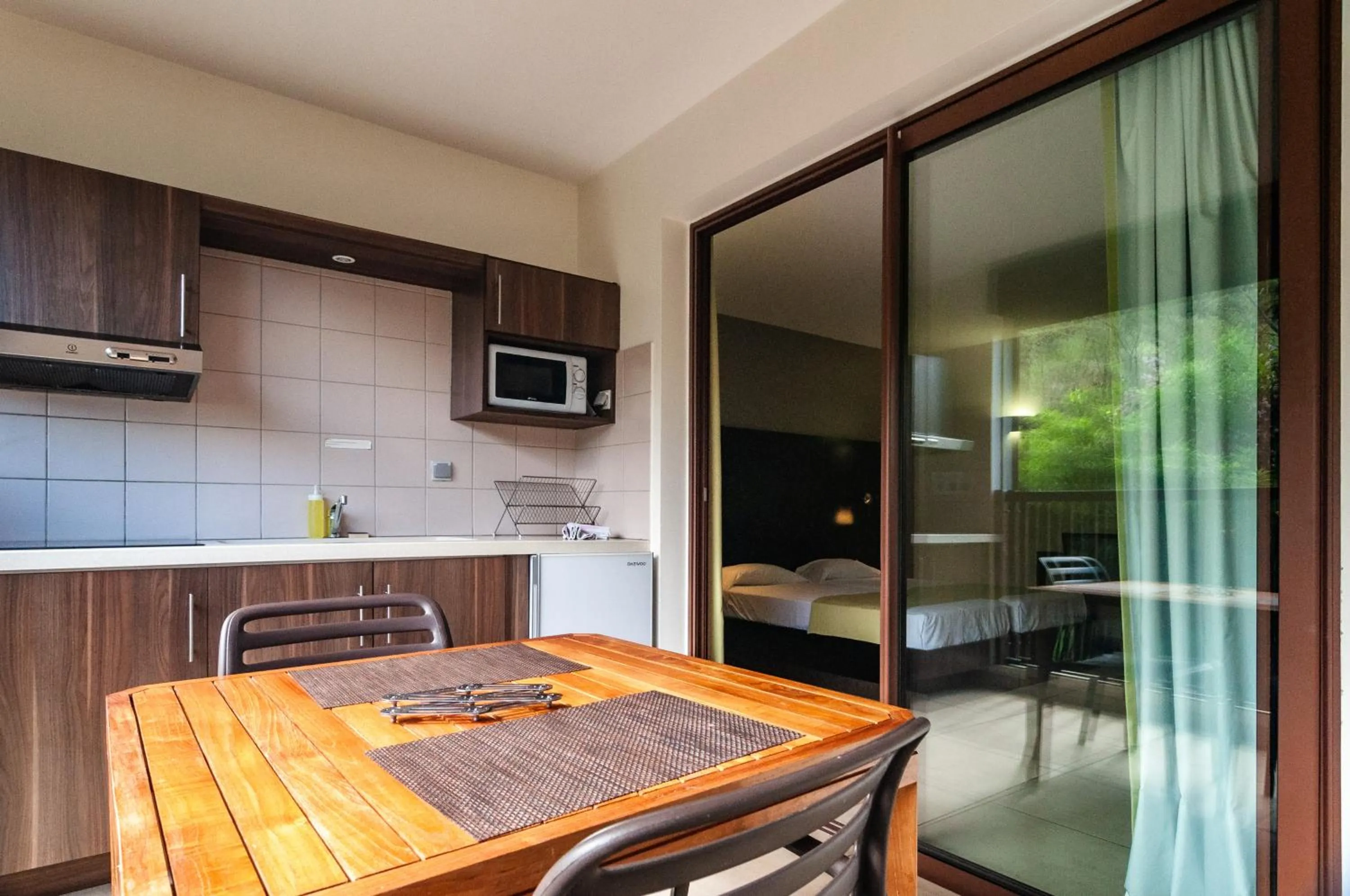 Kitchen or kitchenette in Tama Hotel