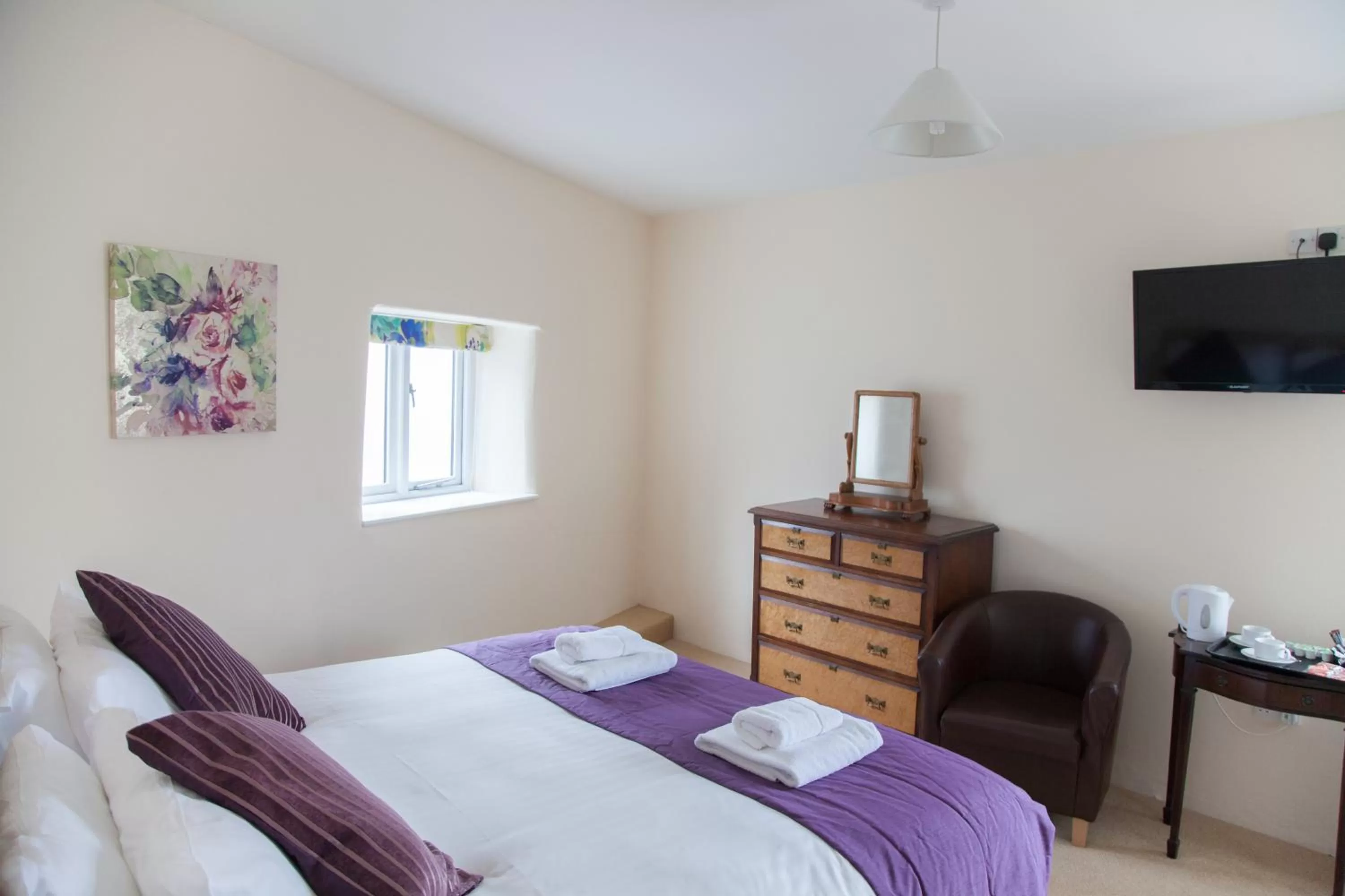 Bed in The Poltimore Inn