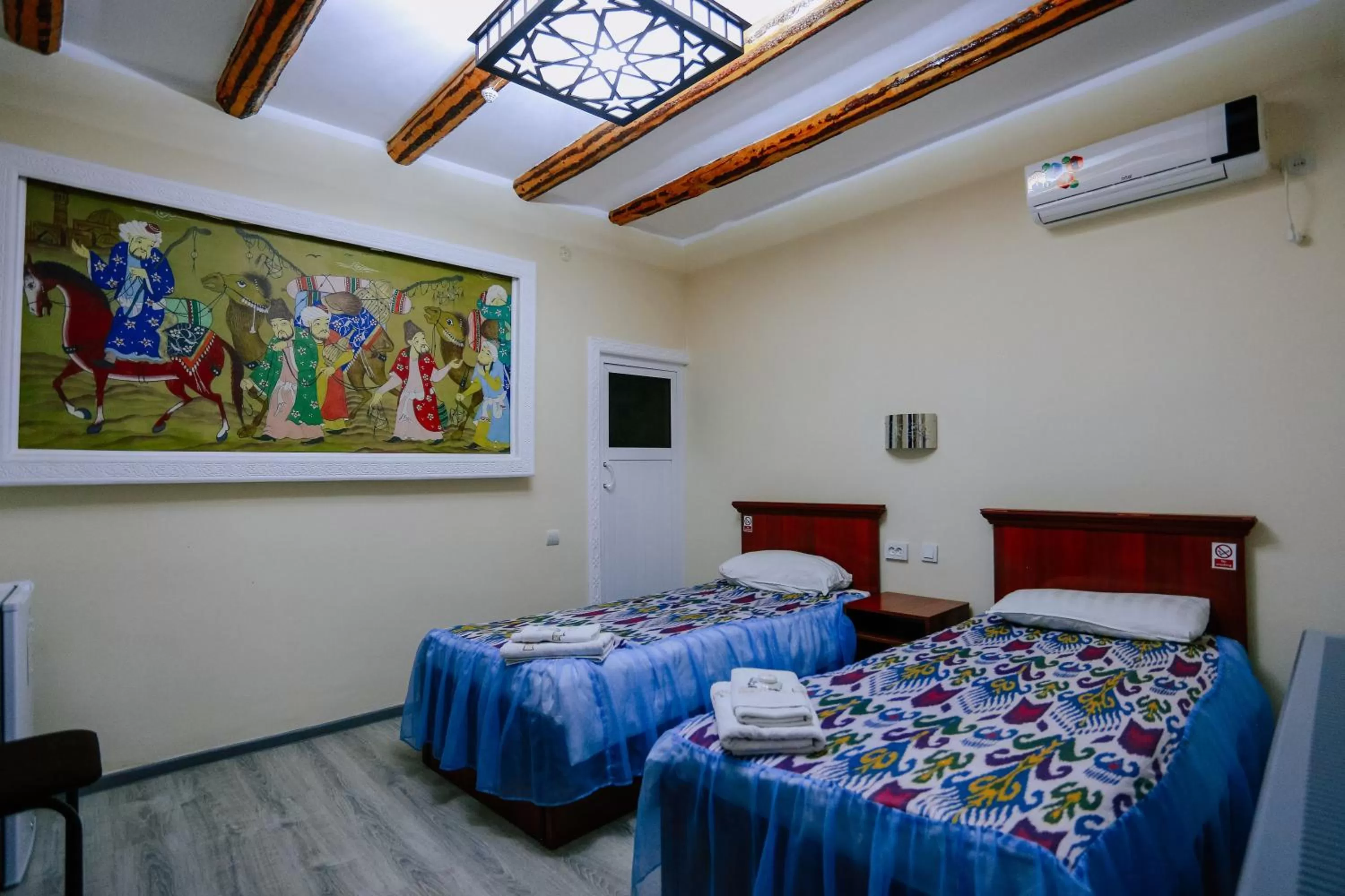 Photo of the whole room, Bed in Bukhara house hotel