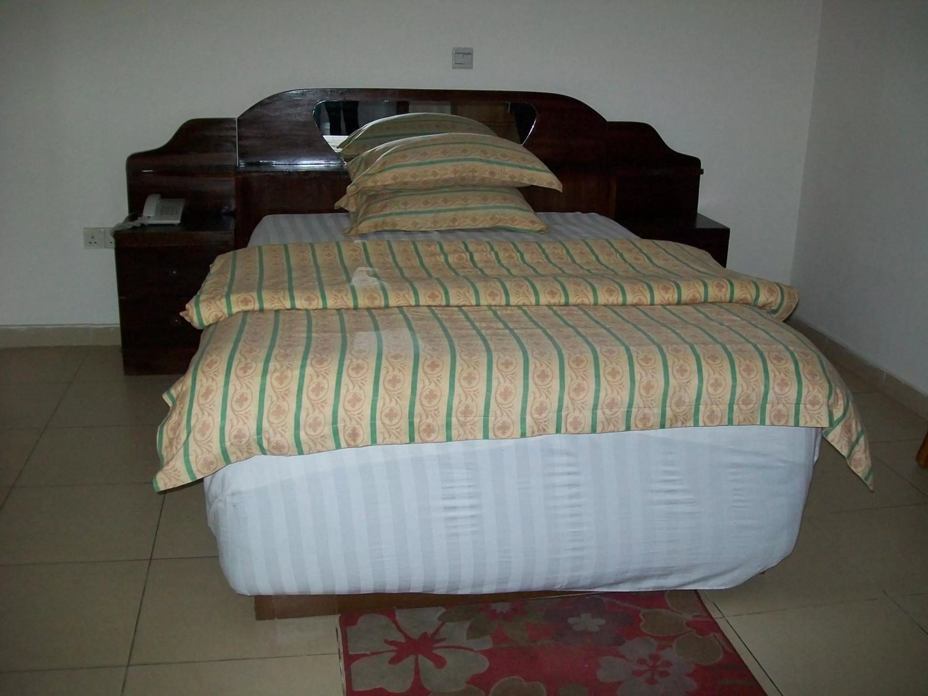 Bed in Ampomaah Hotel