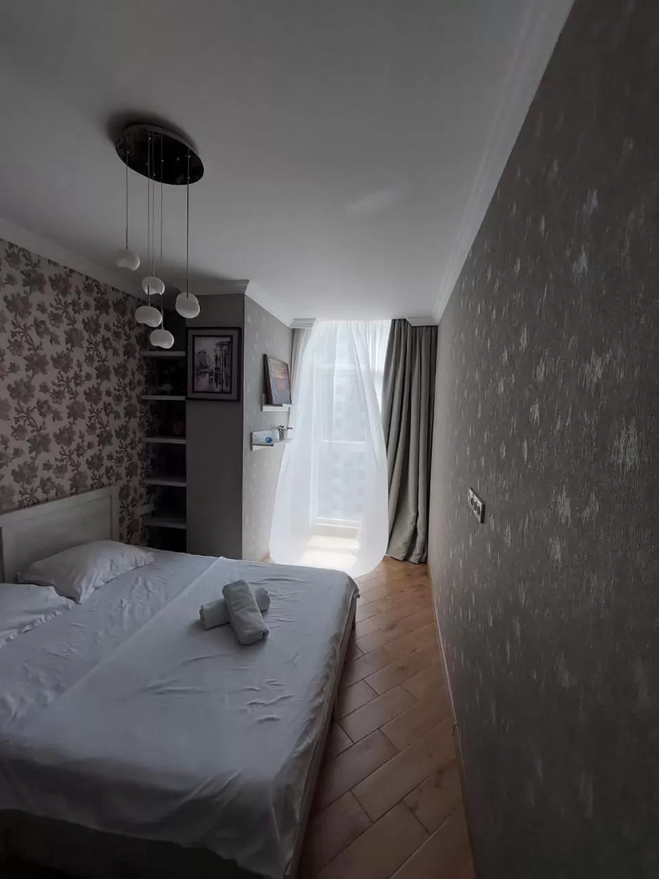 Bed in Orbi Lux Apartment
