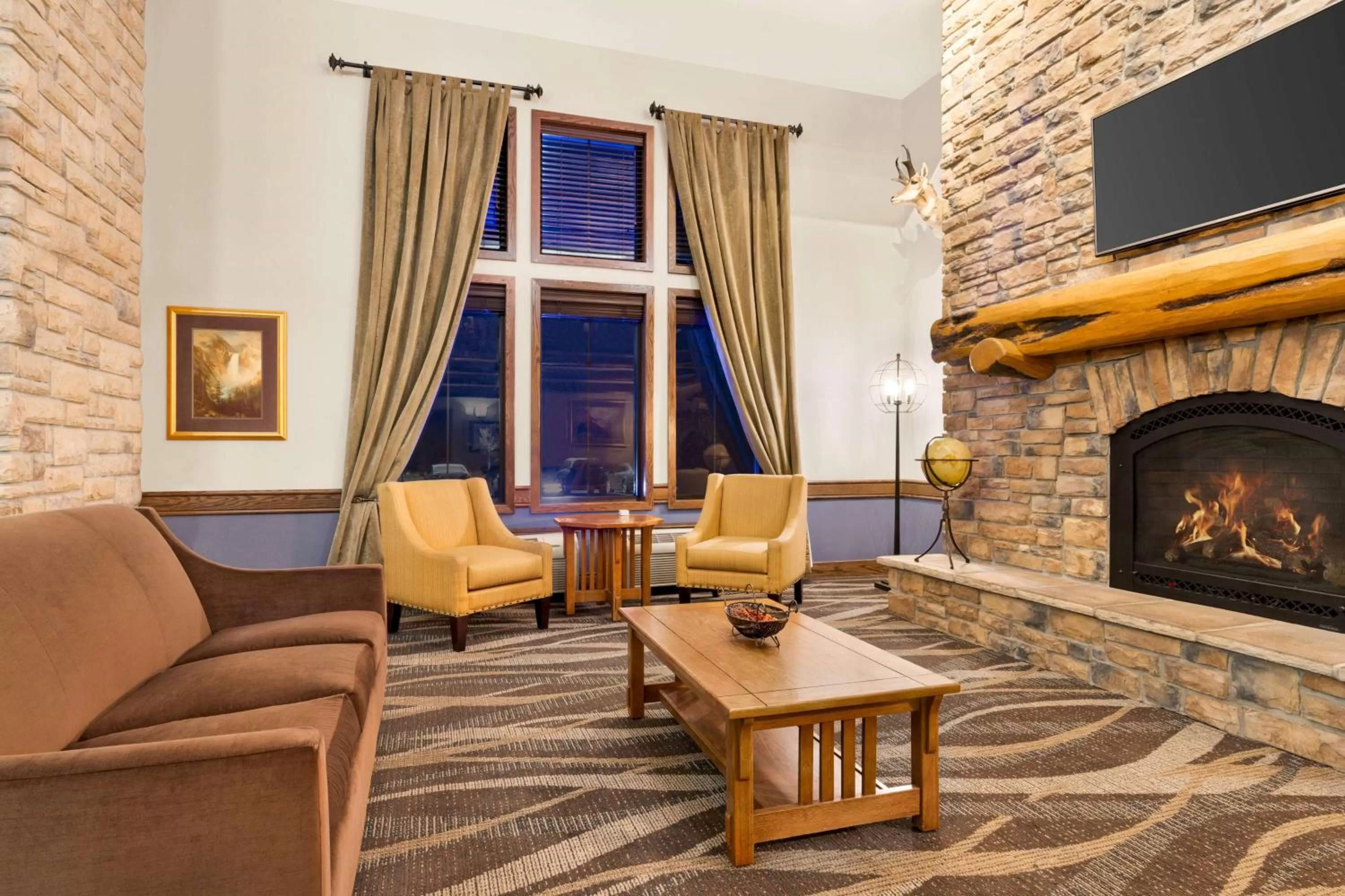 Lobby or reception in AmericInn by Wyndham Laramie Near University of Wyoming