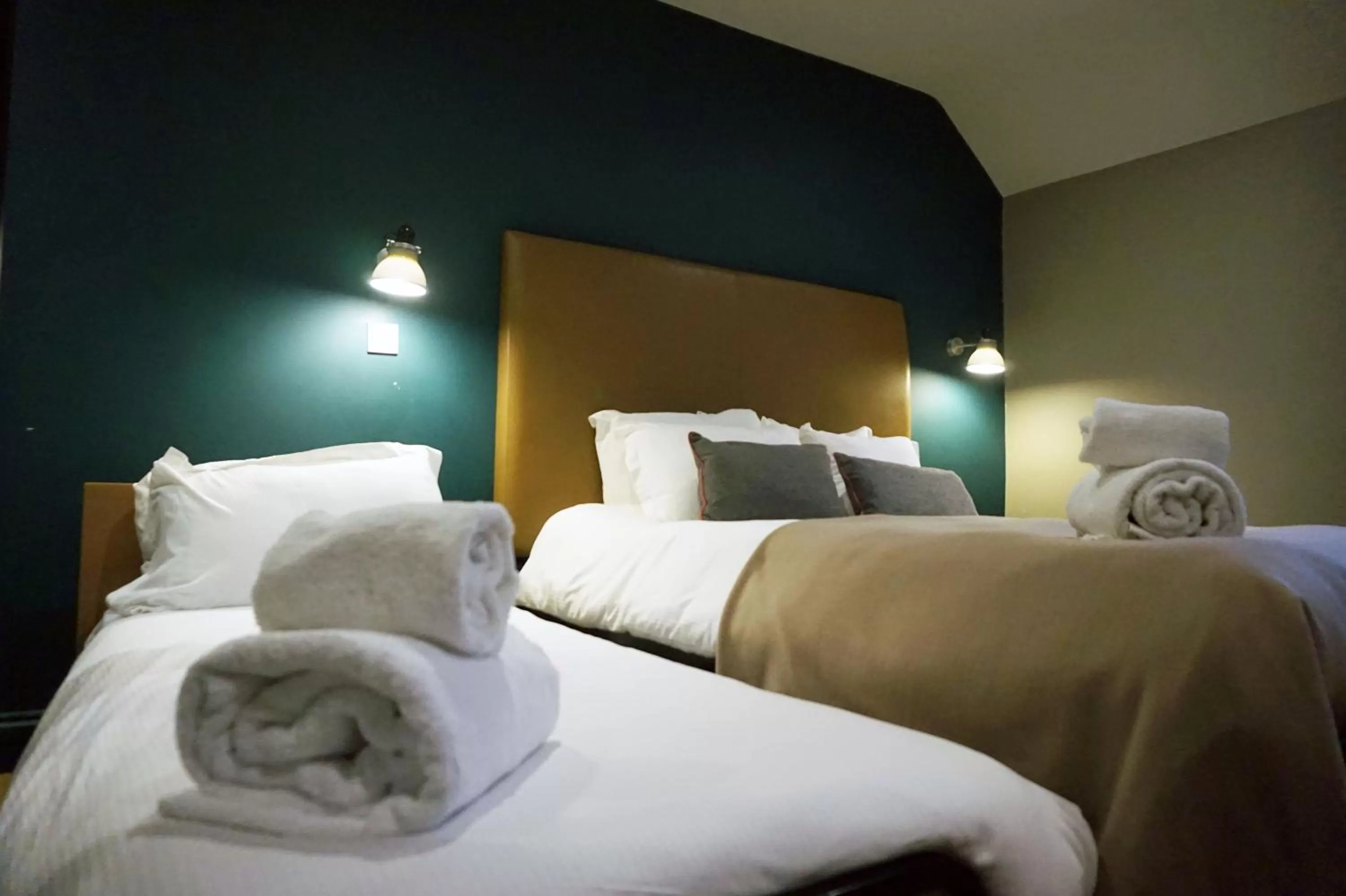 Bed in The Penny Farthing Hotel