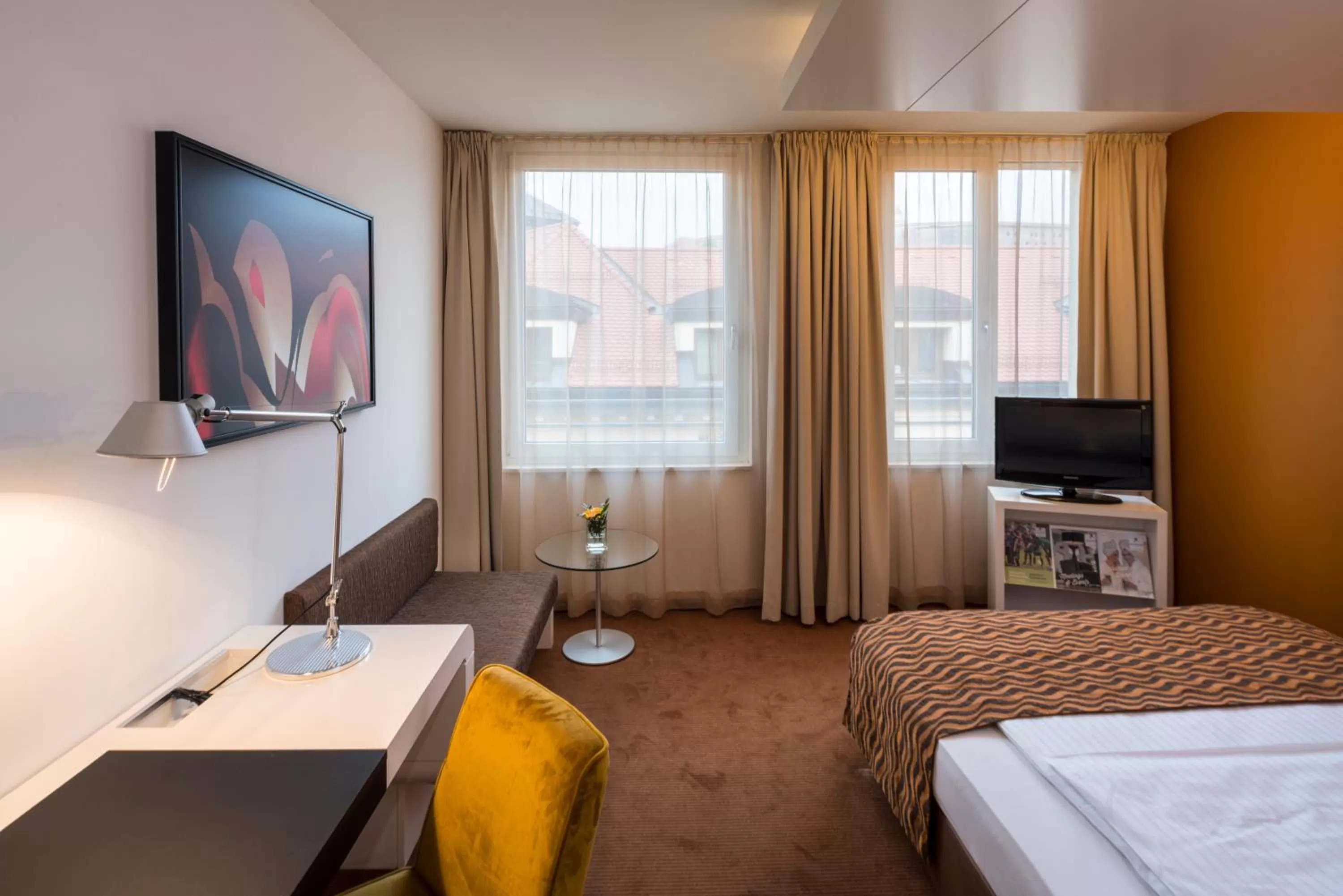 Seating area, Bed in Falkensteiner Hotel Bratislava