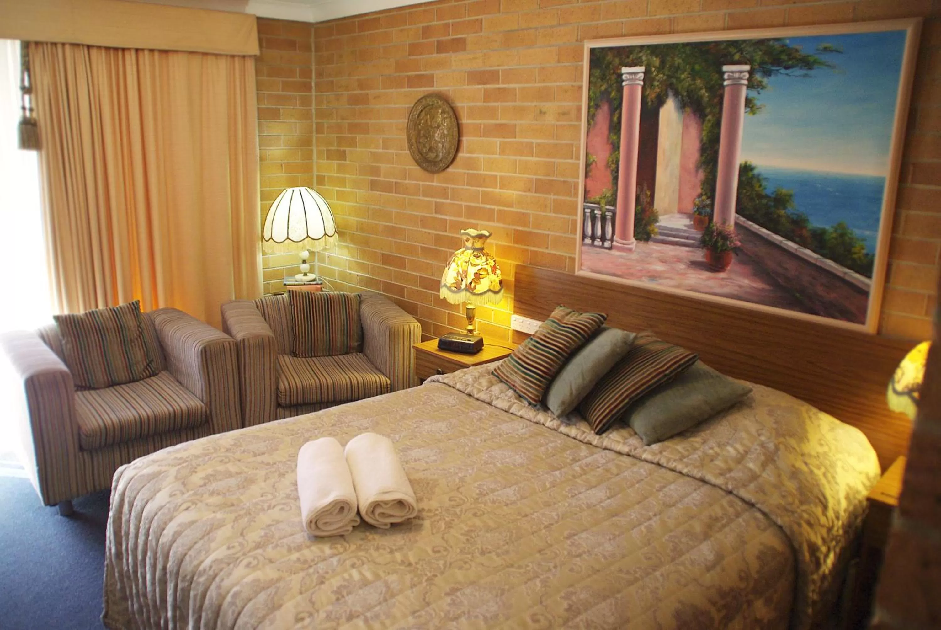 Bed in White Lanterns Motel