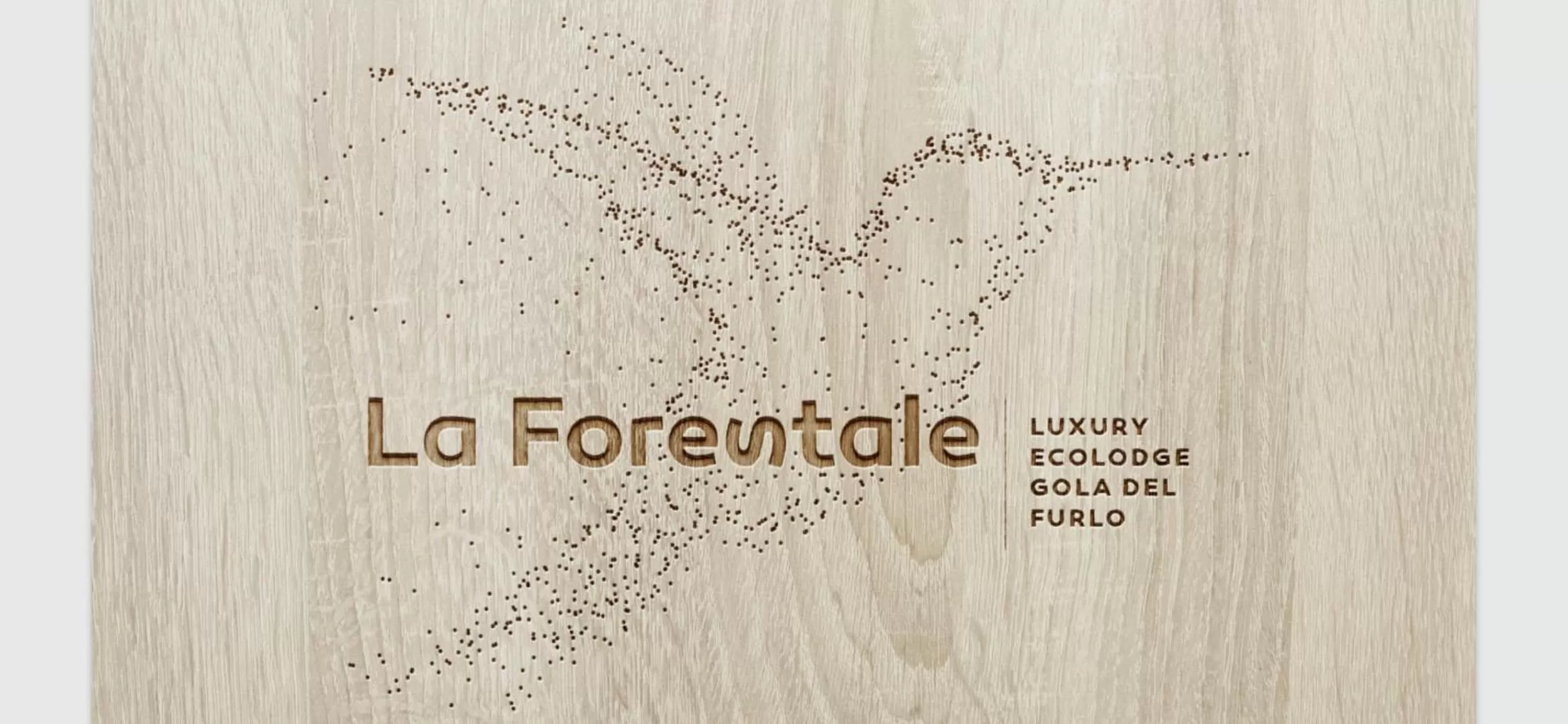 Property logo or sign in La Forestale Luxury Ecolodge B&B Primo Piano