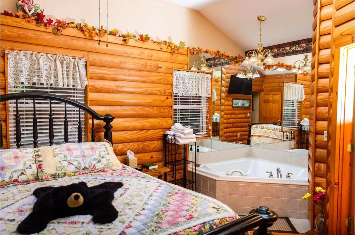 Bed in Mountain Aire Cottages, Inn, & Glamping