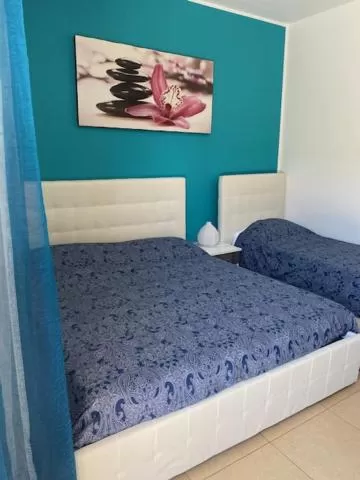 Bed in B&B Sun House