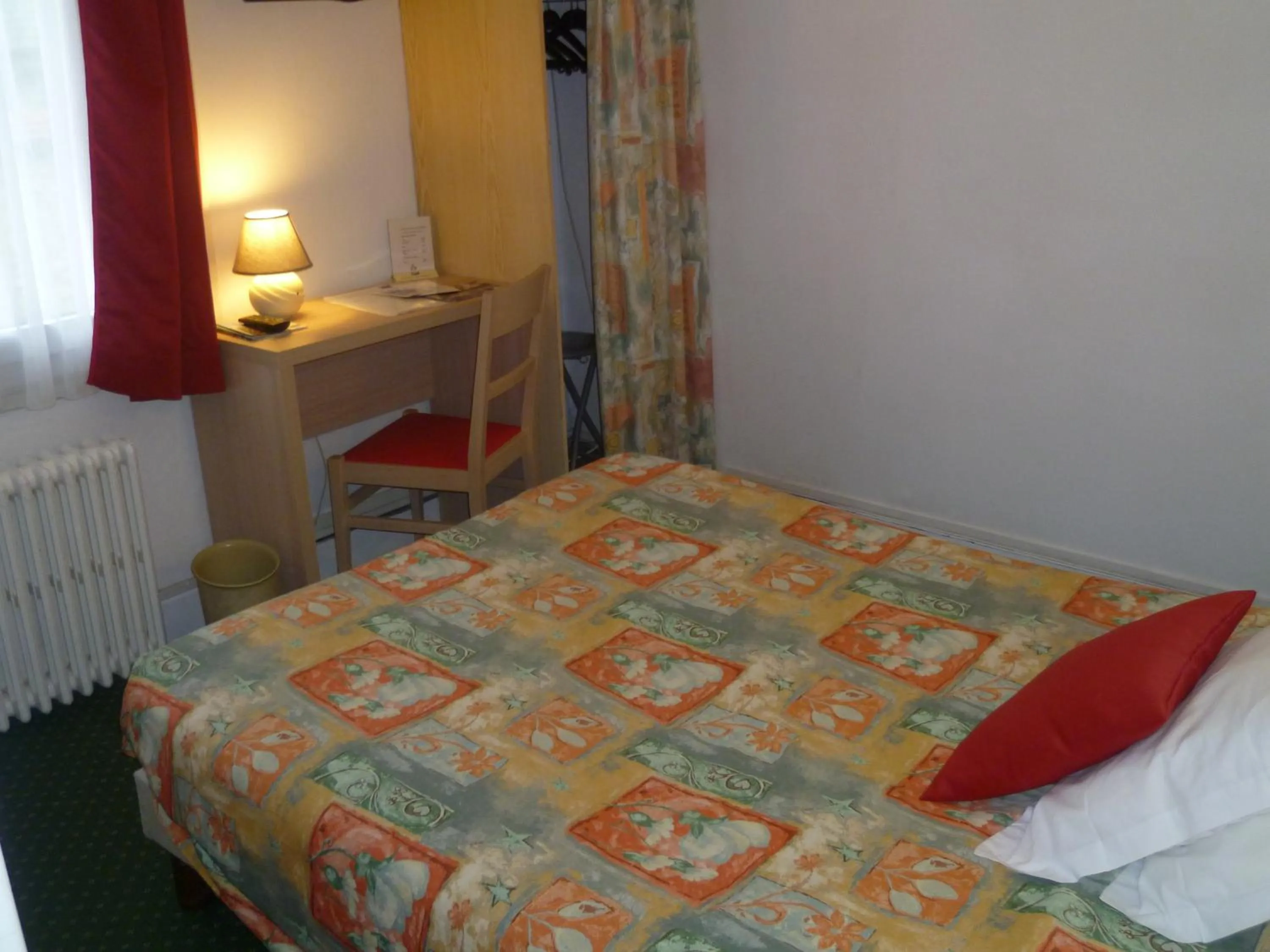 Photo of the whole room, Bed in Hôtel Beauséjour