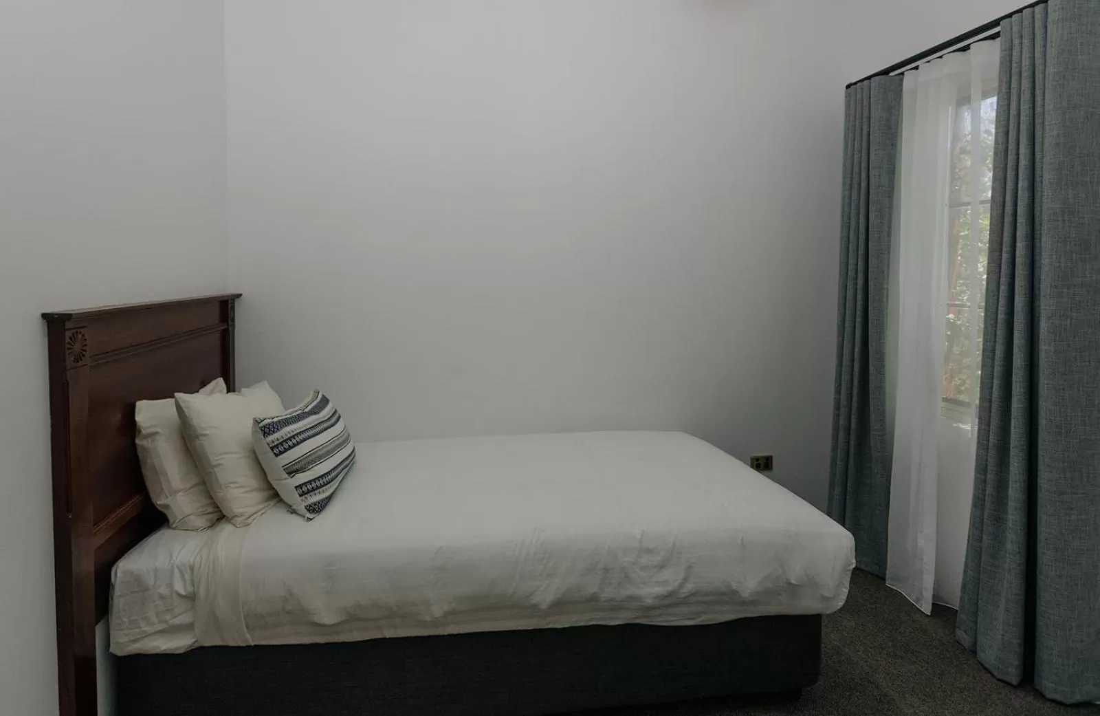 Bed in The Lawson Riverside Suites