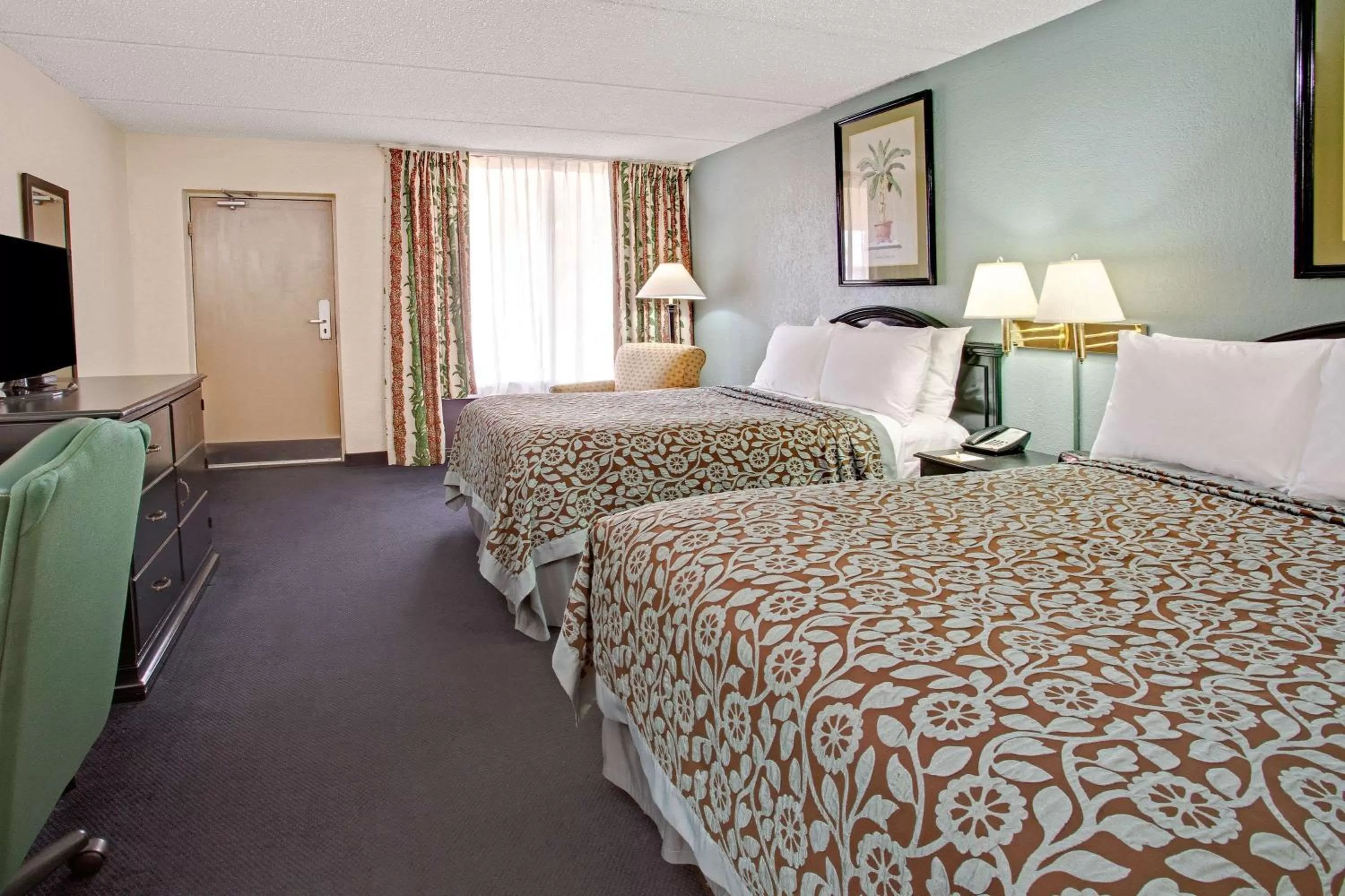 Photo of the whole room, Bed in Days Inn by Wyndham Orlando Airport Florida Mall