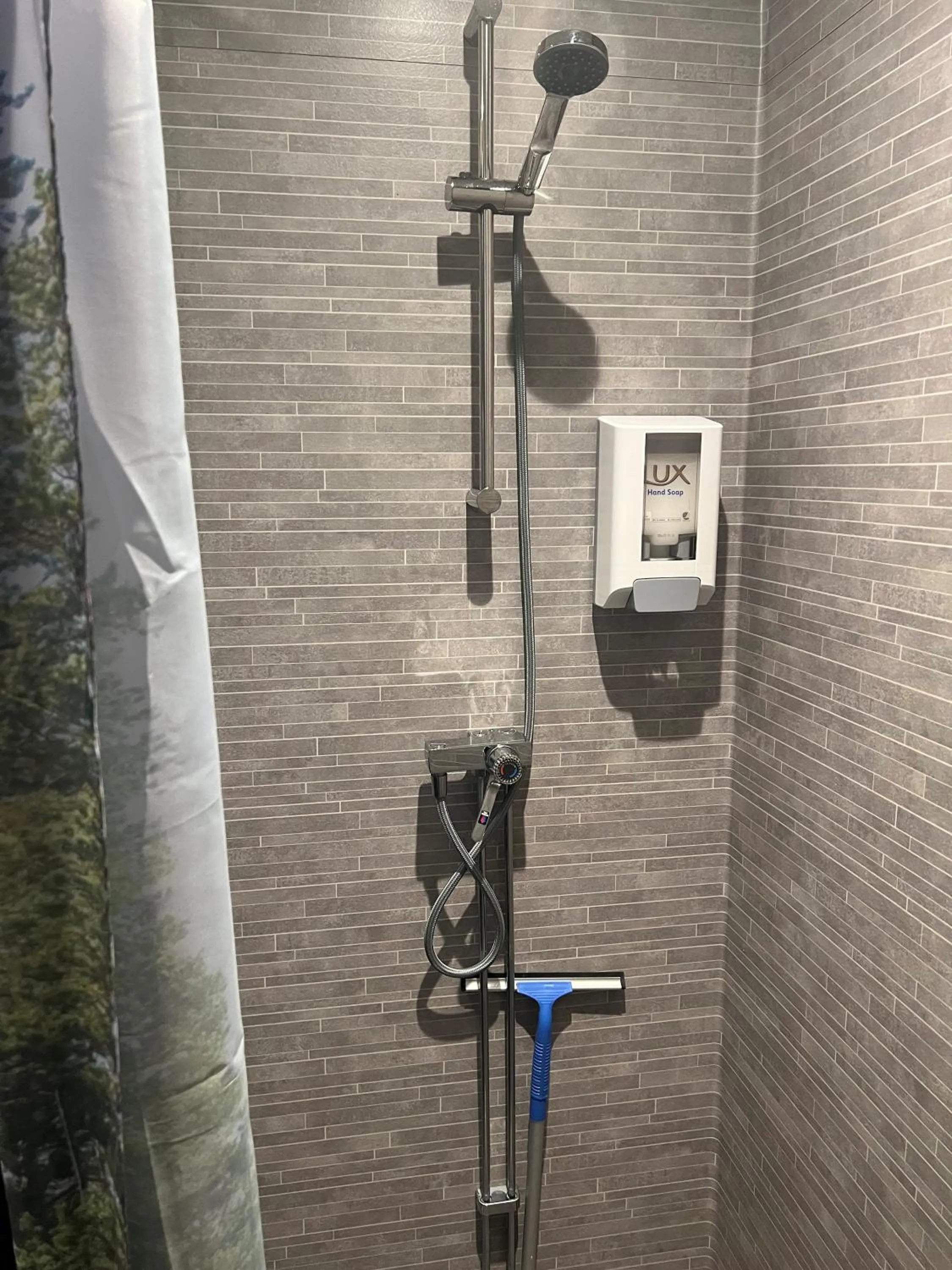 Shower in Hotel E-10 by First