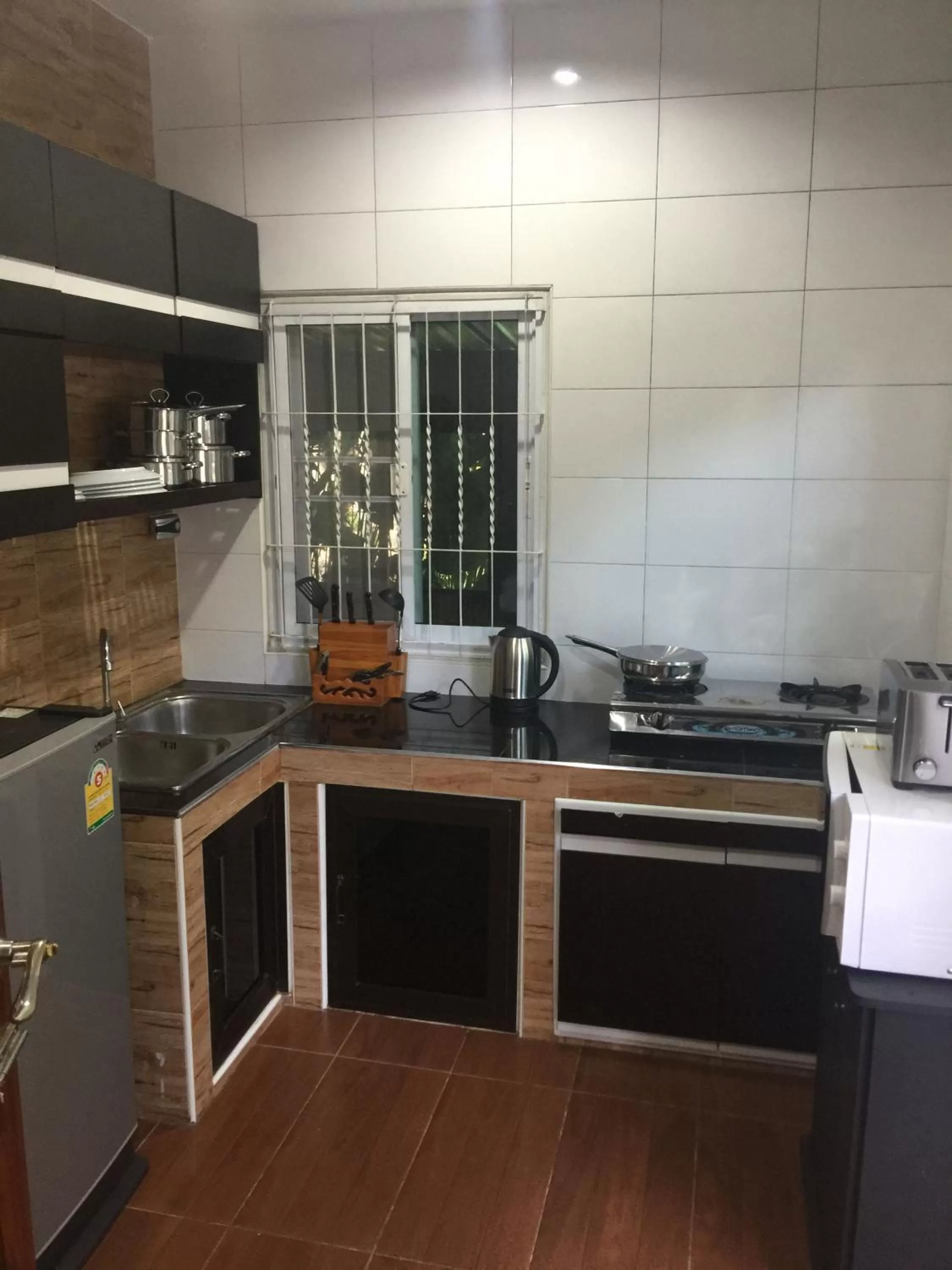 Kitchen or kitchenette in The White Elephant Resort