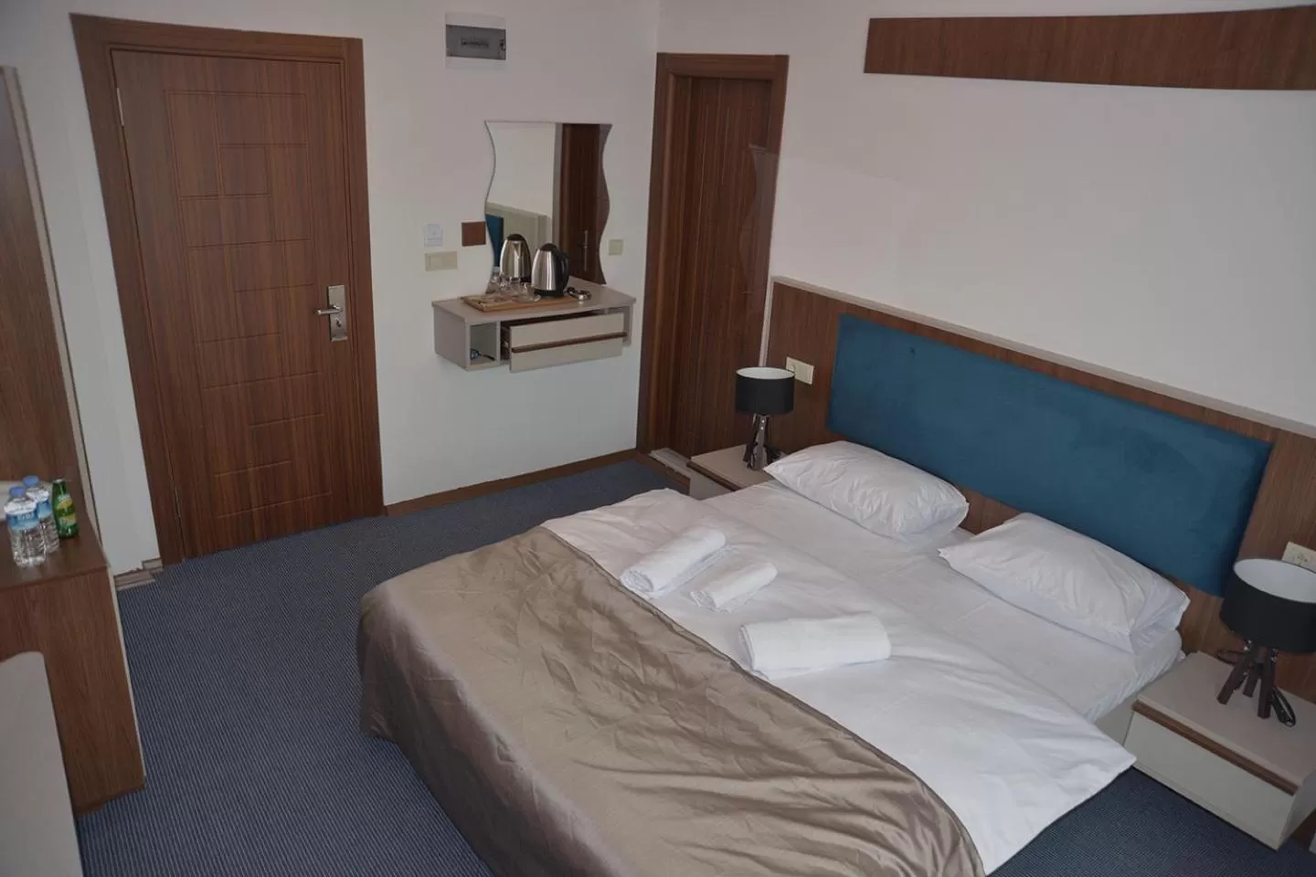 Bed in TEVETOGLU HOTEL