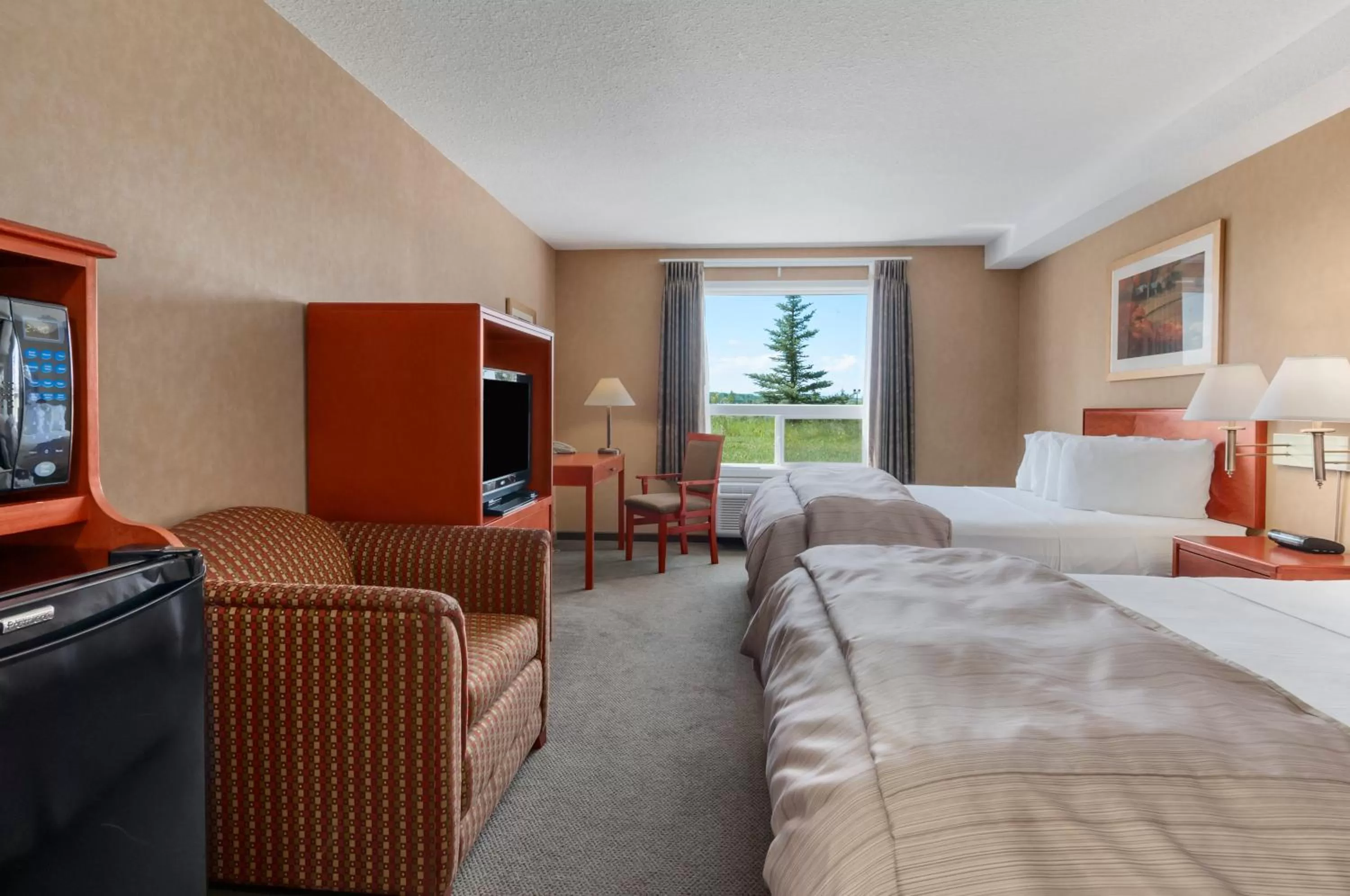 Bedroom, Bed in Days Inn & Suites by Wyndham Cochrane