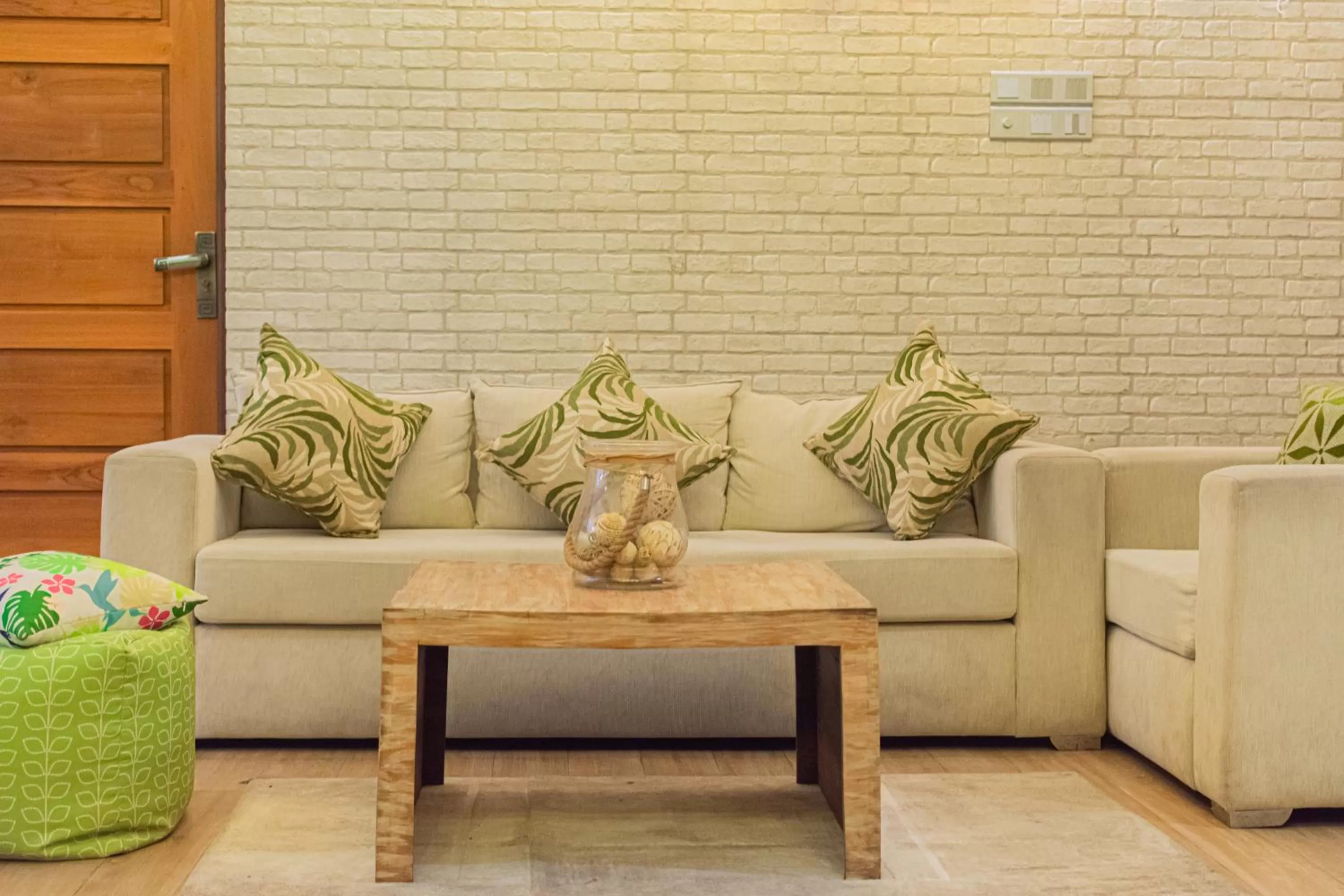 Seating area in J leaf Hotel by Blue Bird