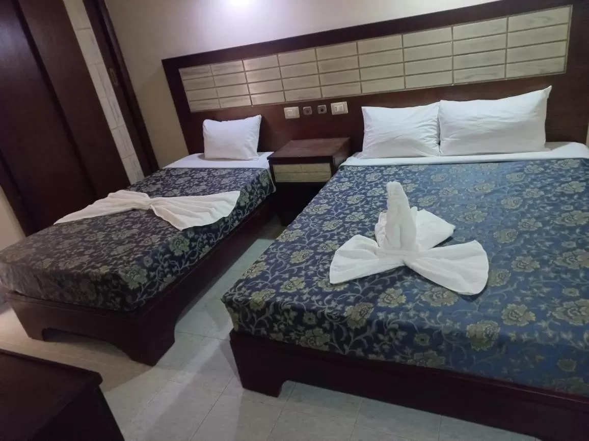 Bed in Windsor Hotel Luxor 中國人之家