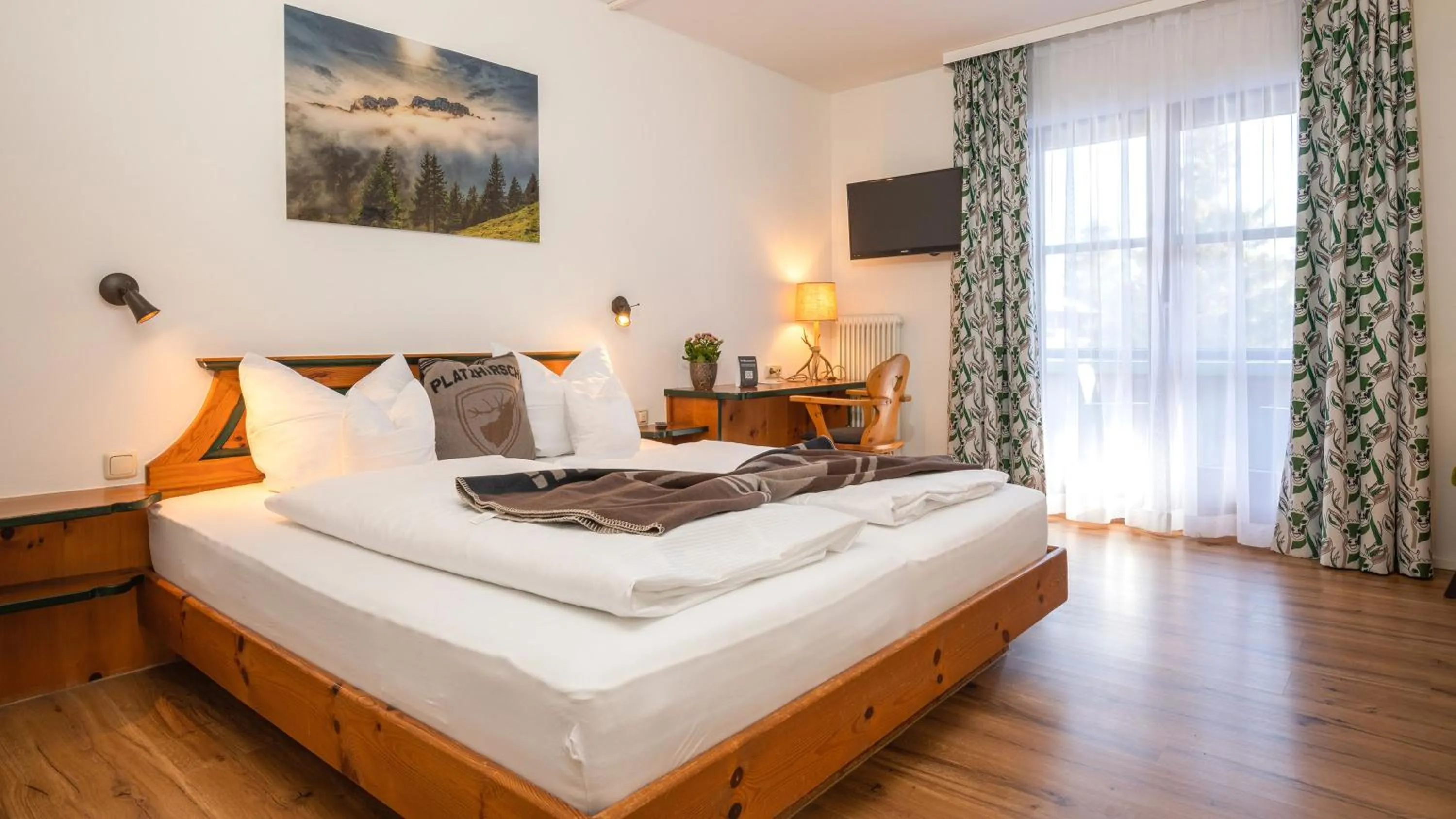Photo of the whole room, Bed in Das Bergmayr - Chiemgauer Alpenhotel