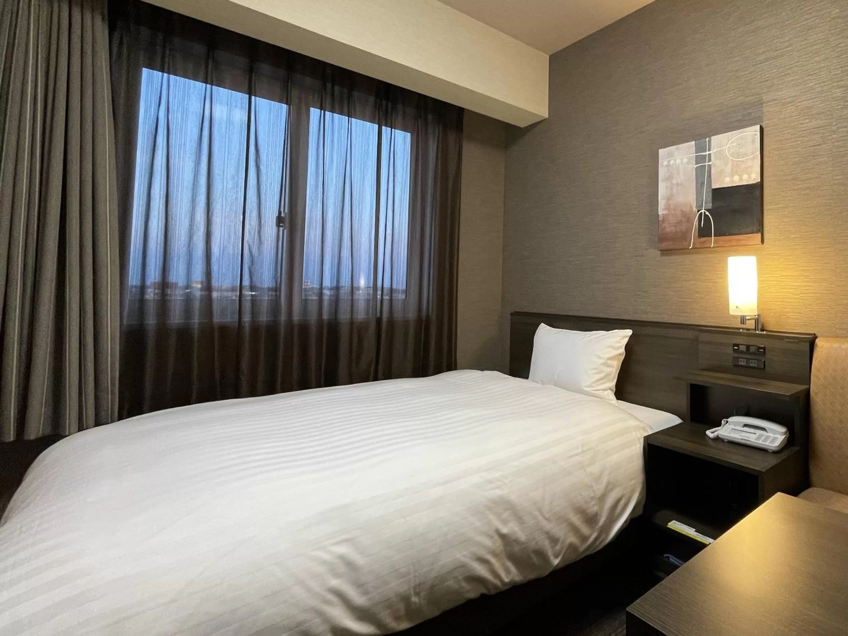 Photo of the whole room, Bed in ​Hotel Route-Inn Kumagaya​