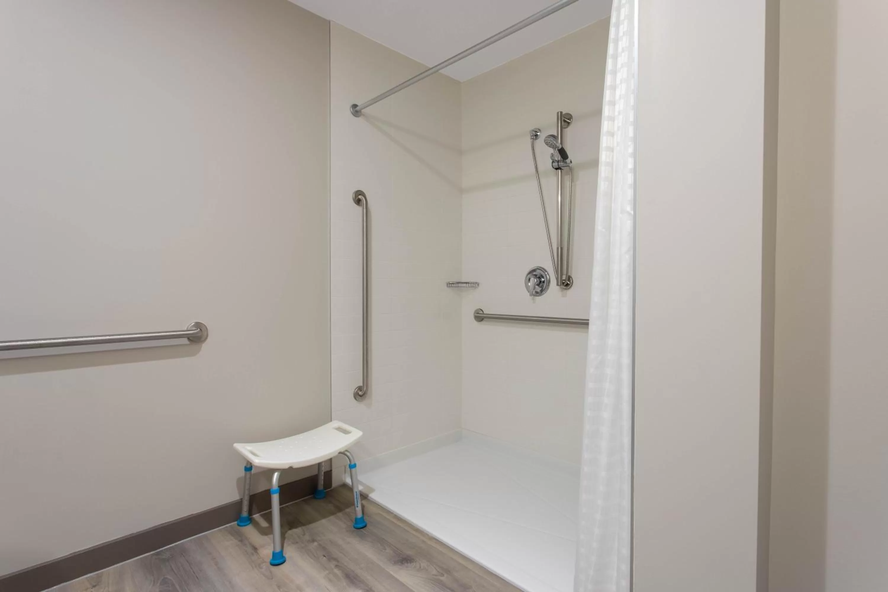Shower in Microtel Inn & Suites by Wyndham Portage La Prairie