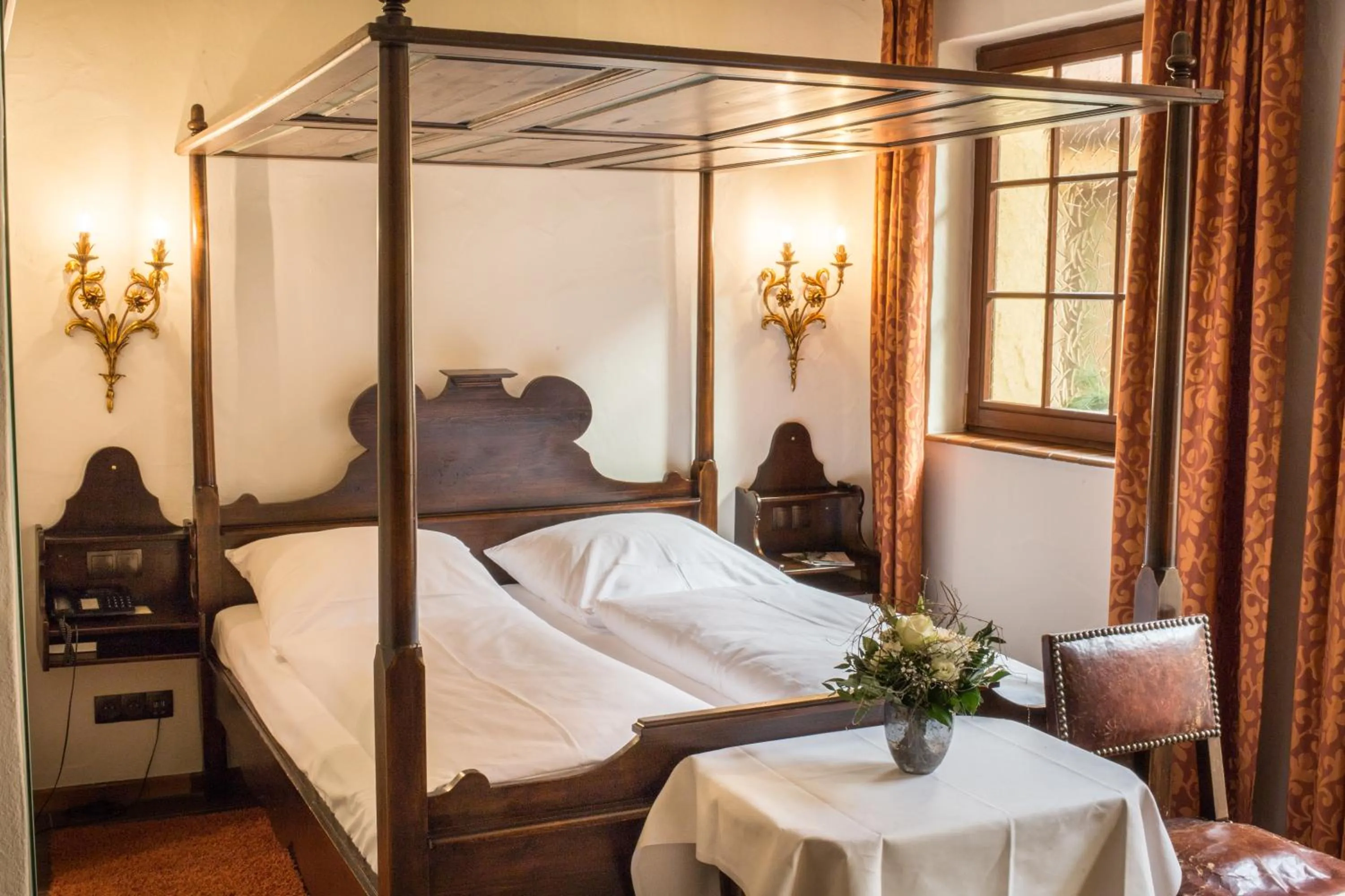 Photo of the whole room, Bed in WAGNERS Hotel Greifen-Post