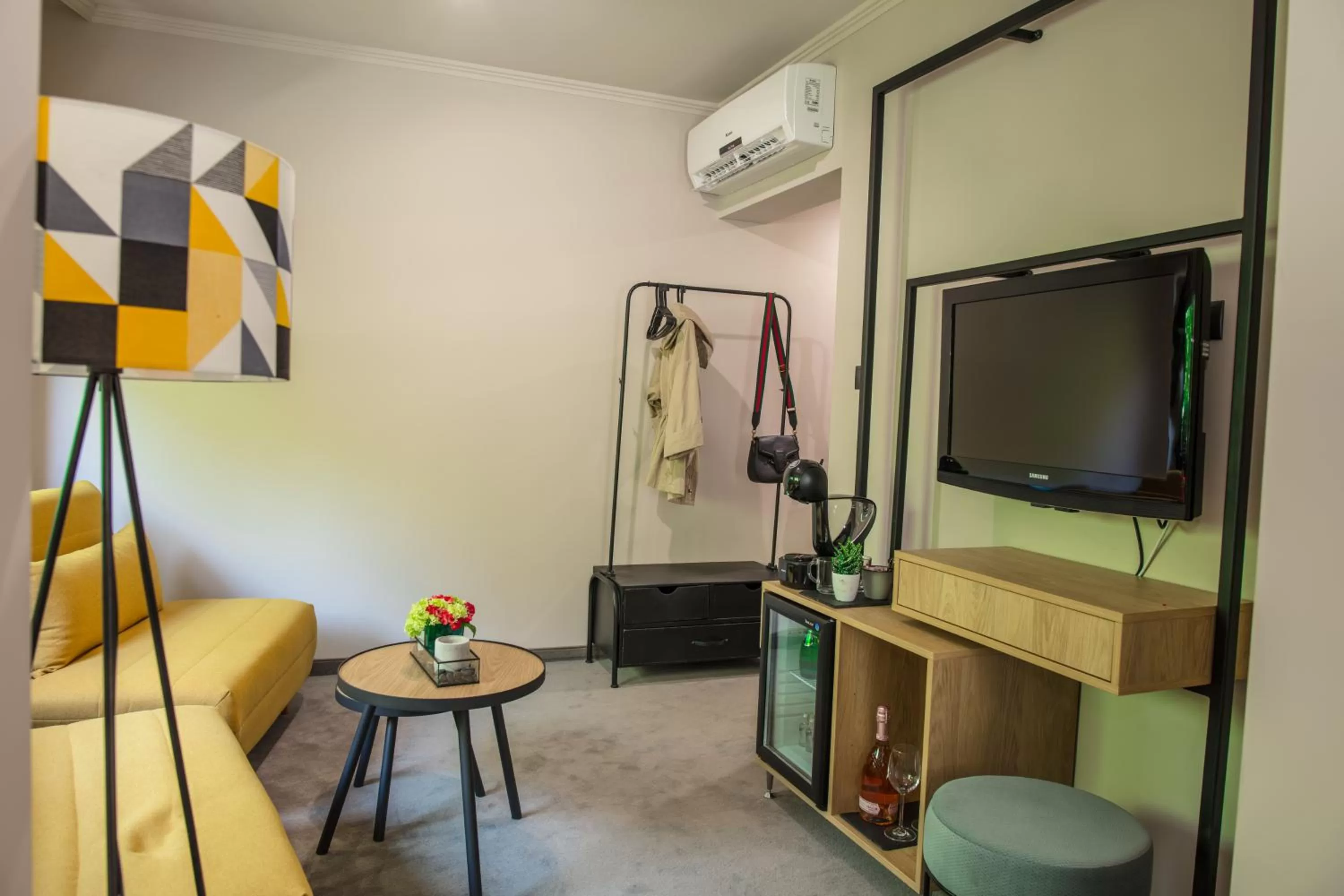 Communal lounge/ TV room in Reverence Boutique Hotel