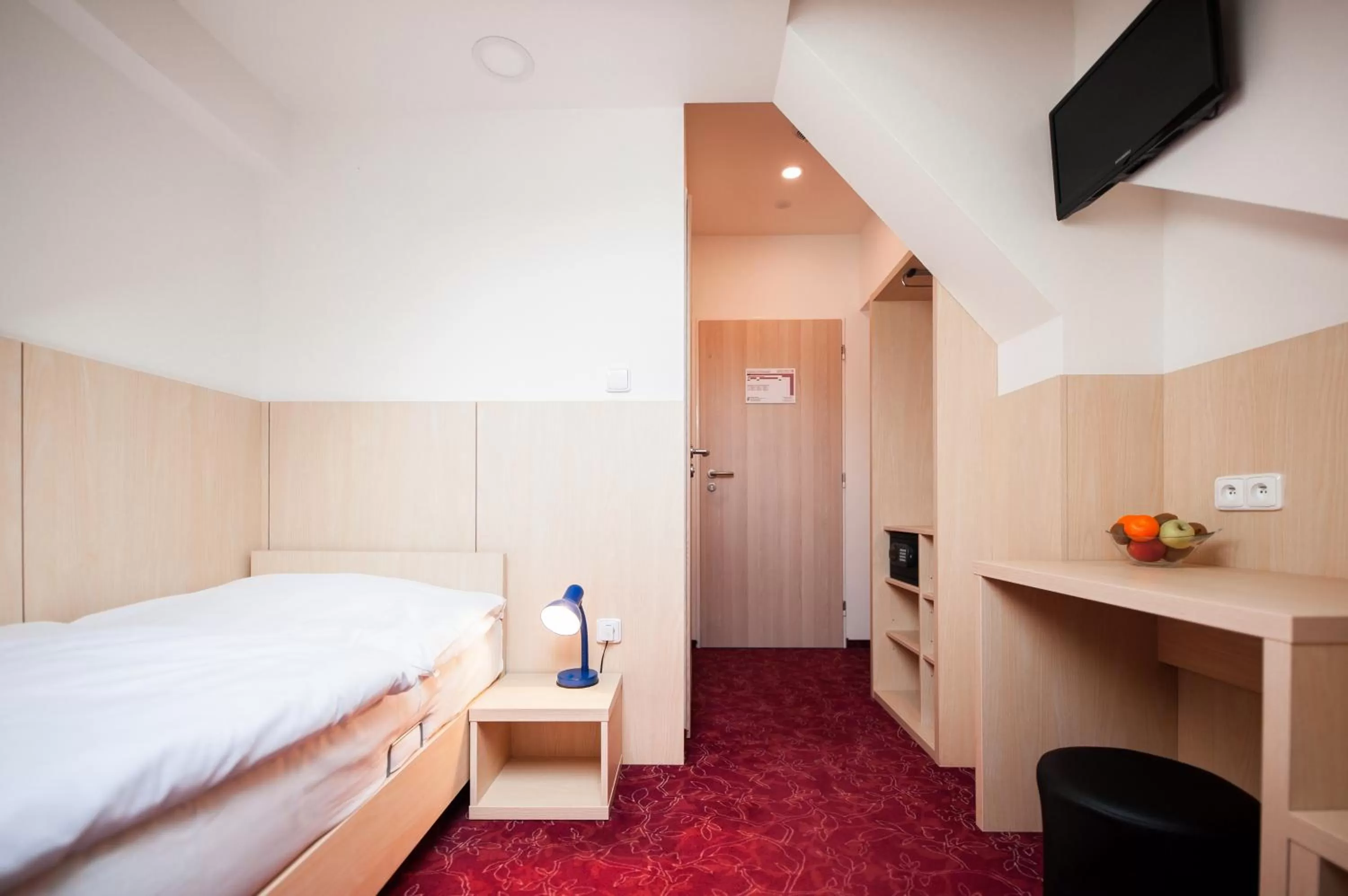 Bed in Hotel Pivovar