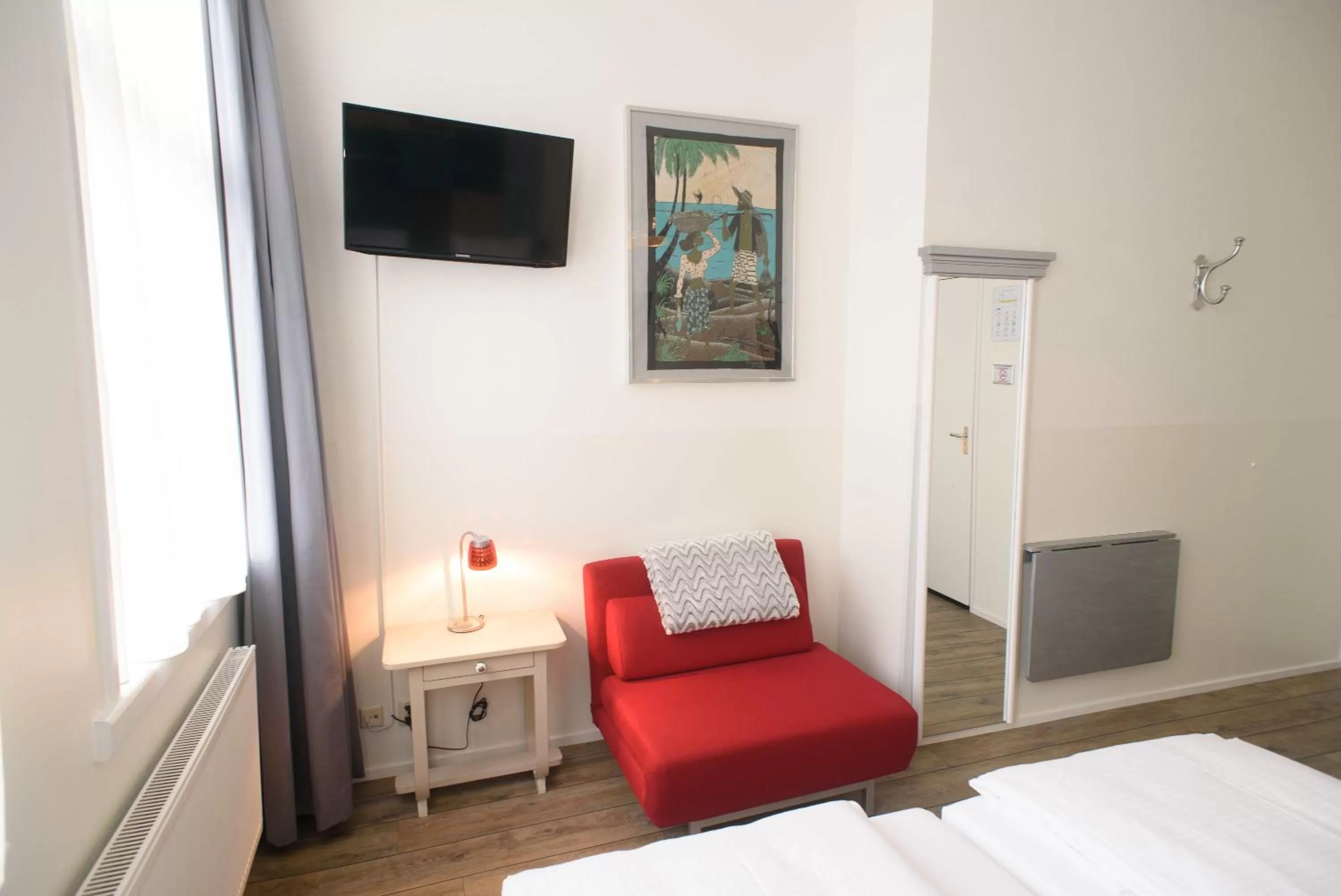 Bedroom, Seating Area in Hotel Buren