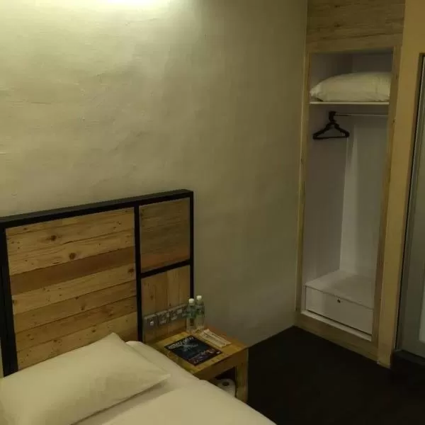 Bed in The Oikos Hotel