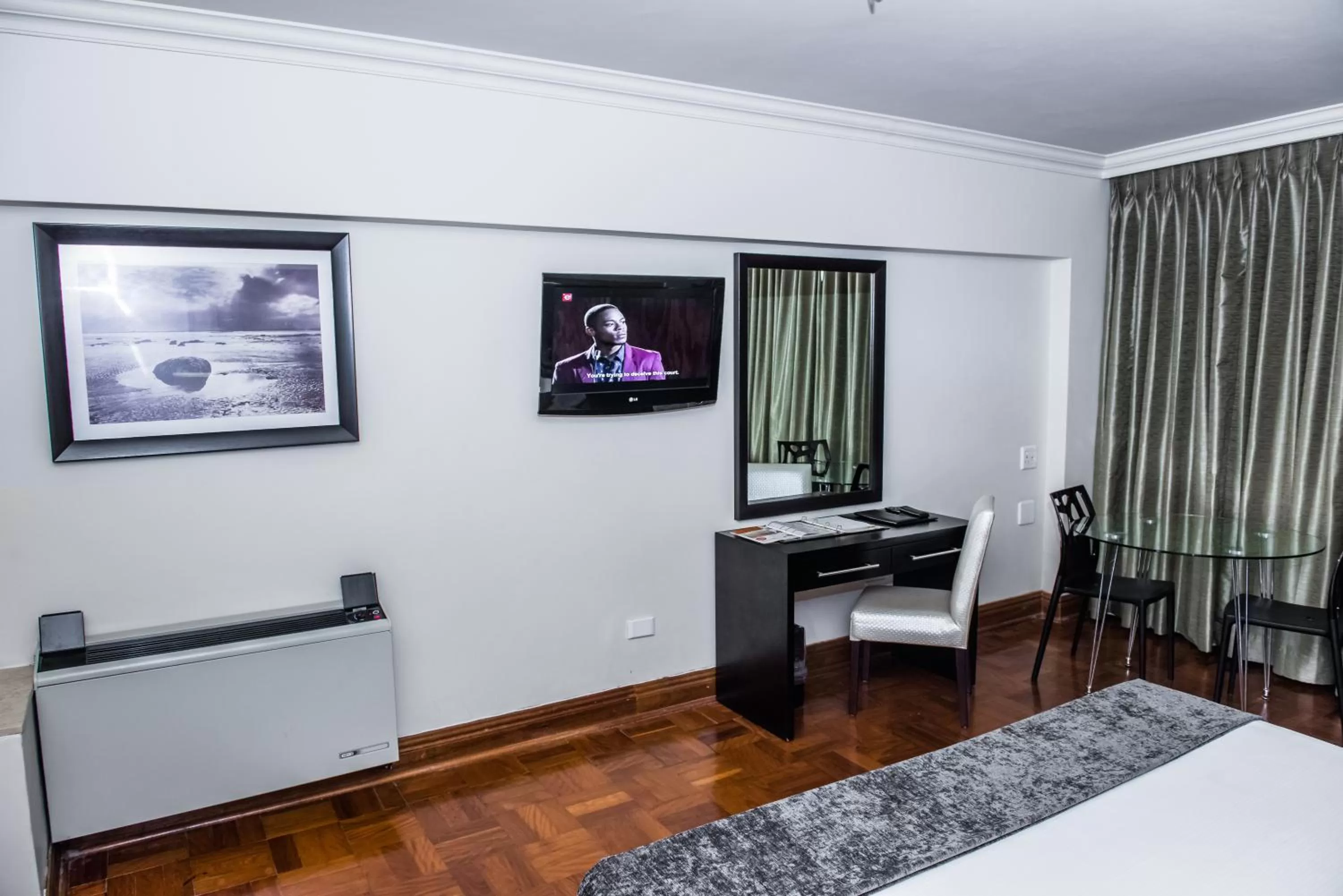 Bedroom, Bed in Belaire Suites Hotel