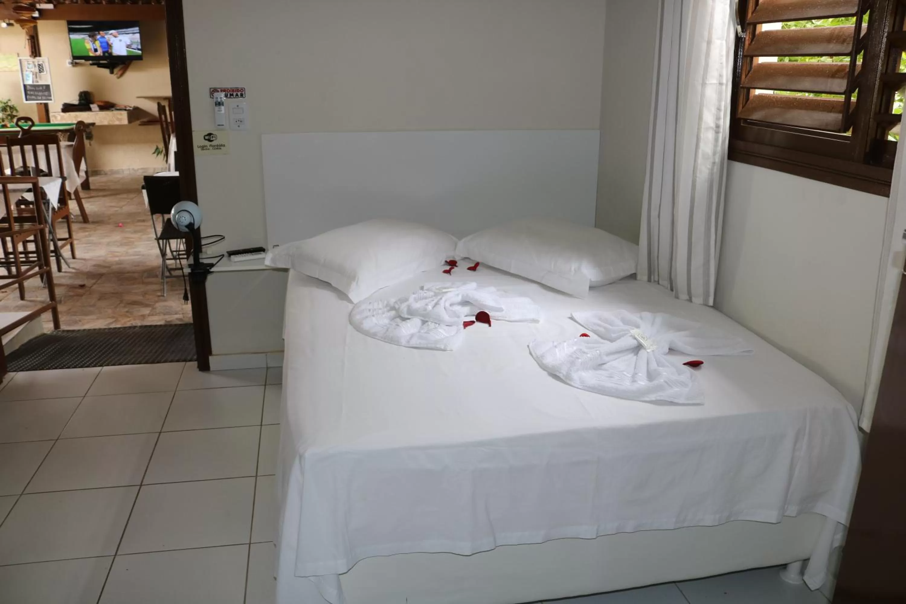 Bed in Pousada Flor Dália