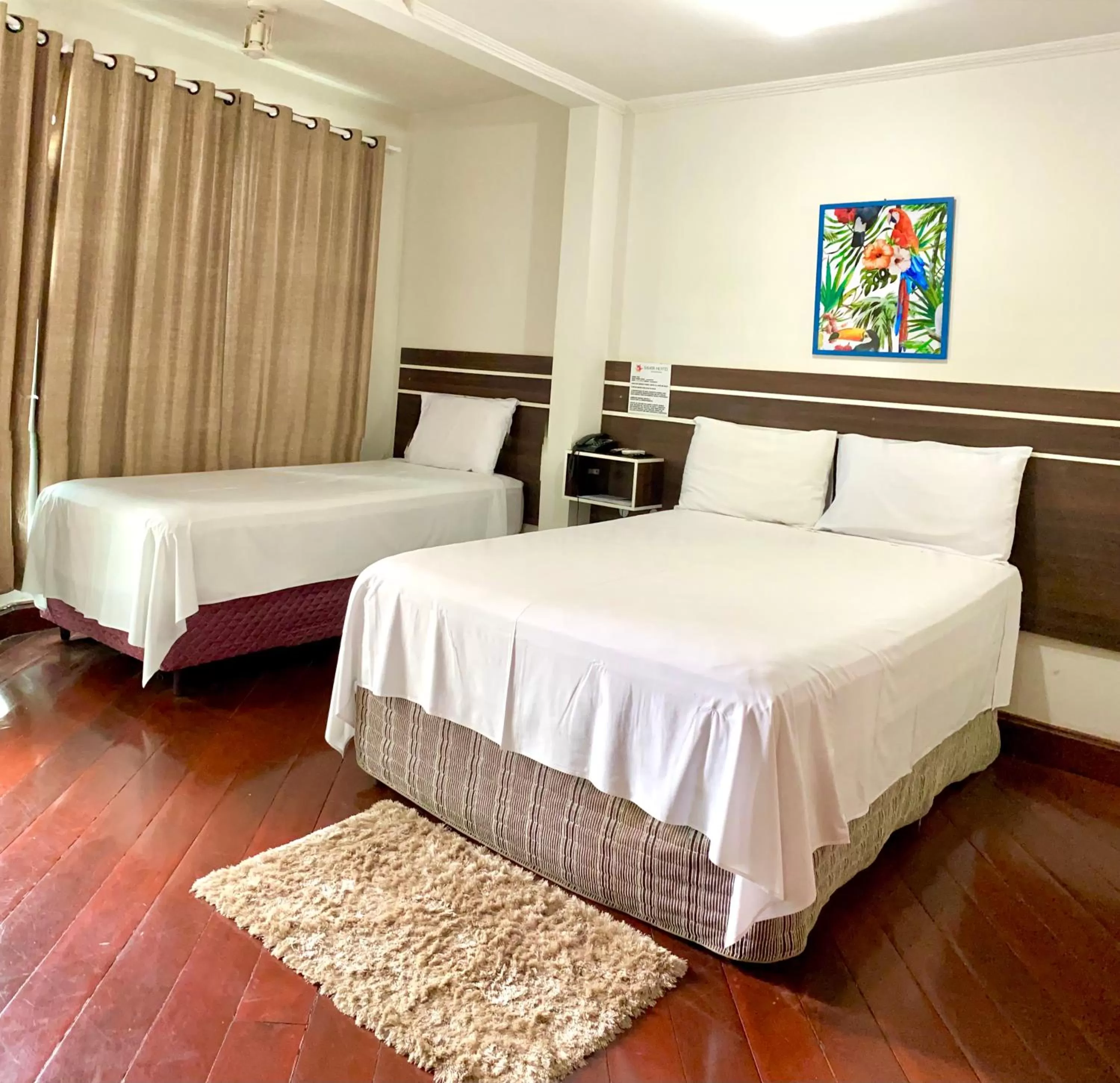 Bed in SAMIR HOTEL COMFORT