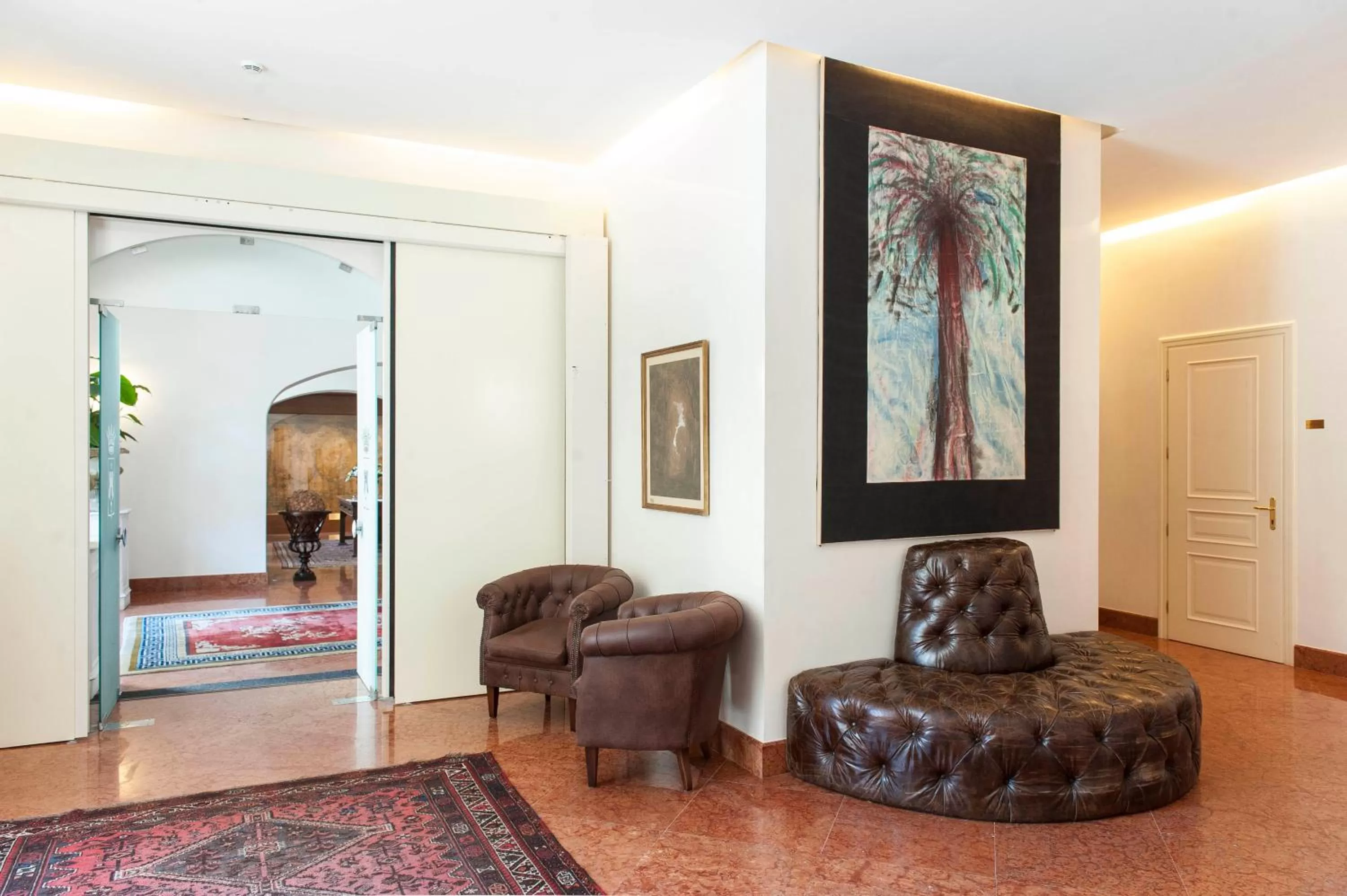 Communal lounge/ TV room in Palazzo Brunaccini Boutique Hotel