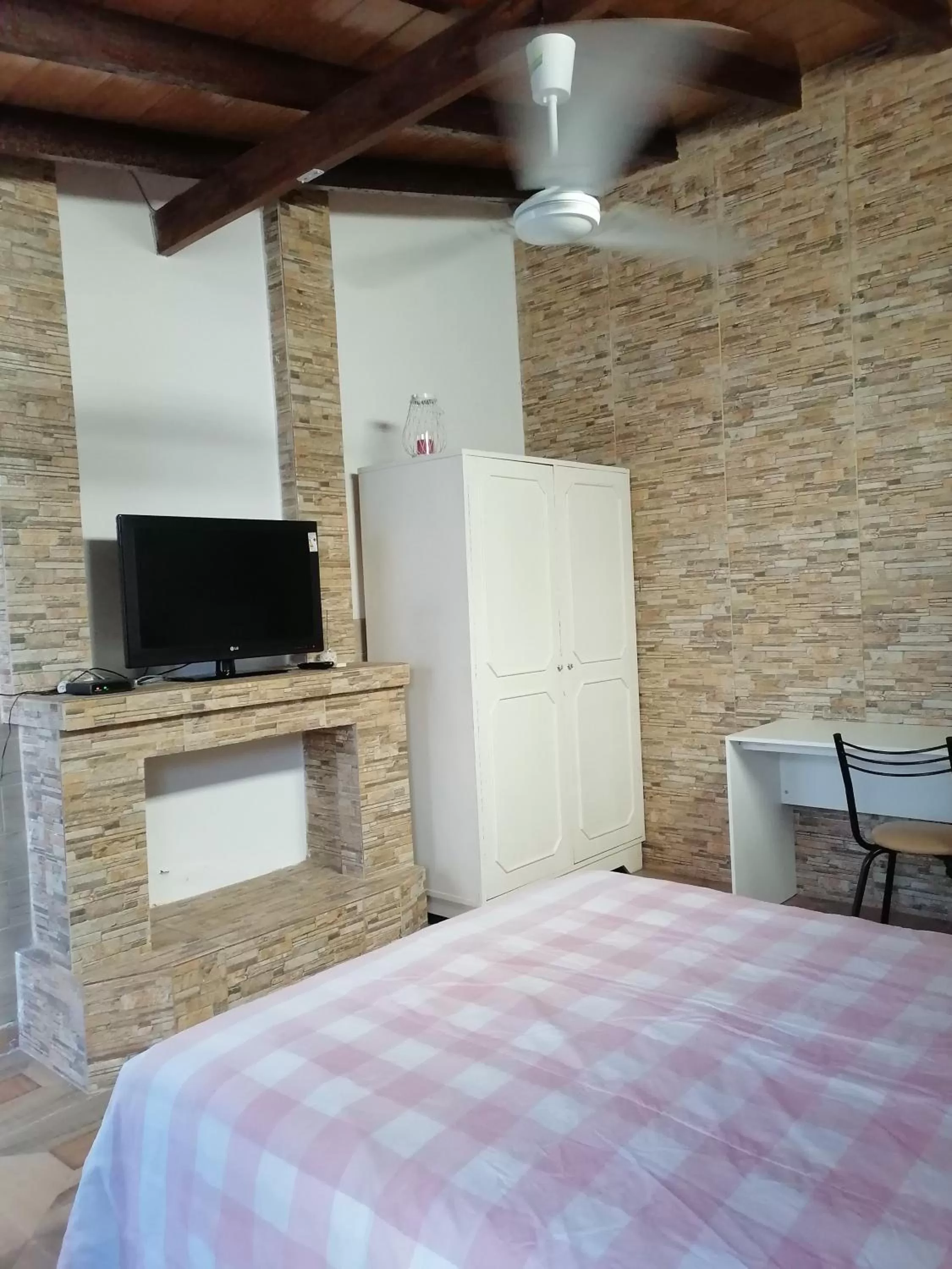 Seating area, Bed in Granados