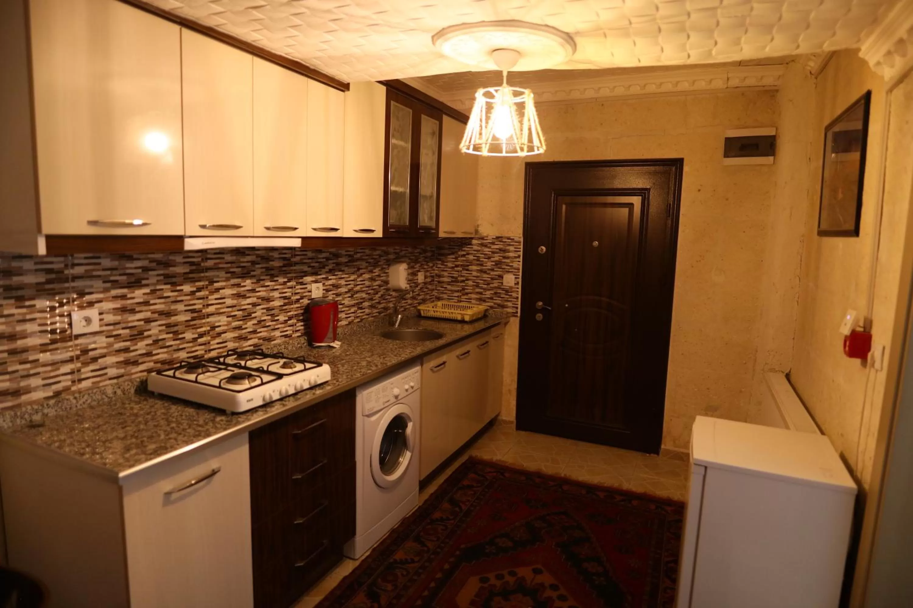 Kitchen or kitchenette in Epoch Stone House