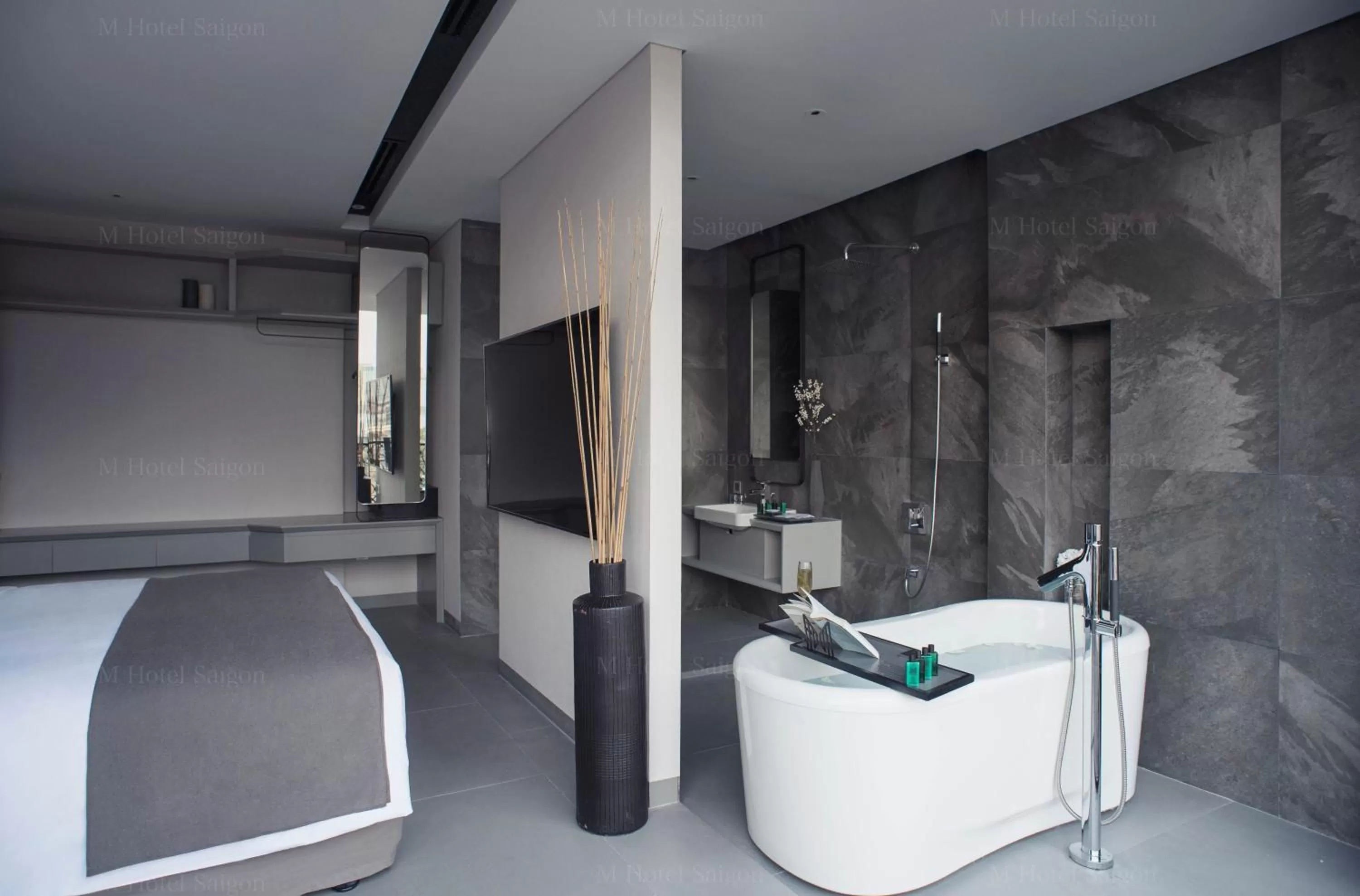 Photo of the whole room, Bed in M Hotel Saigon