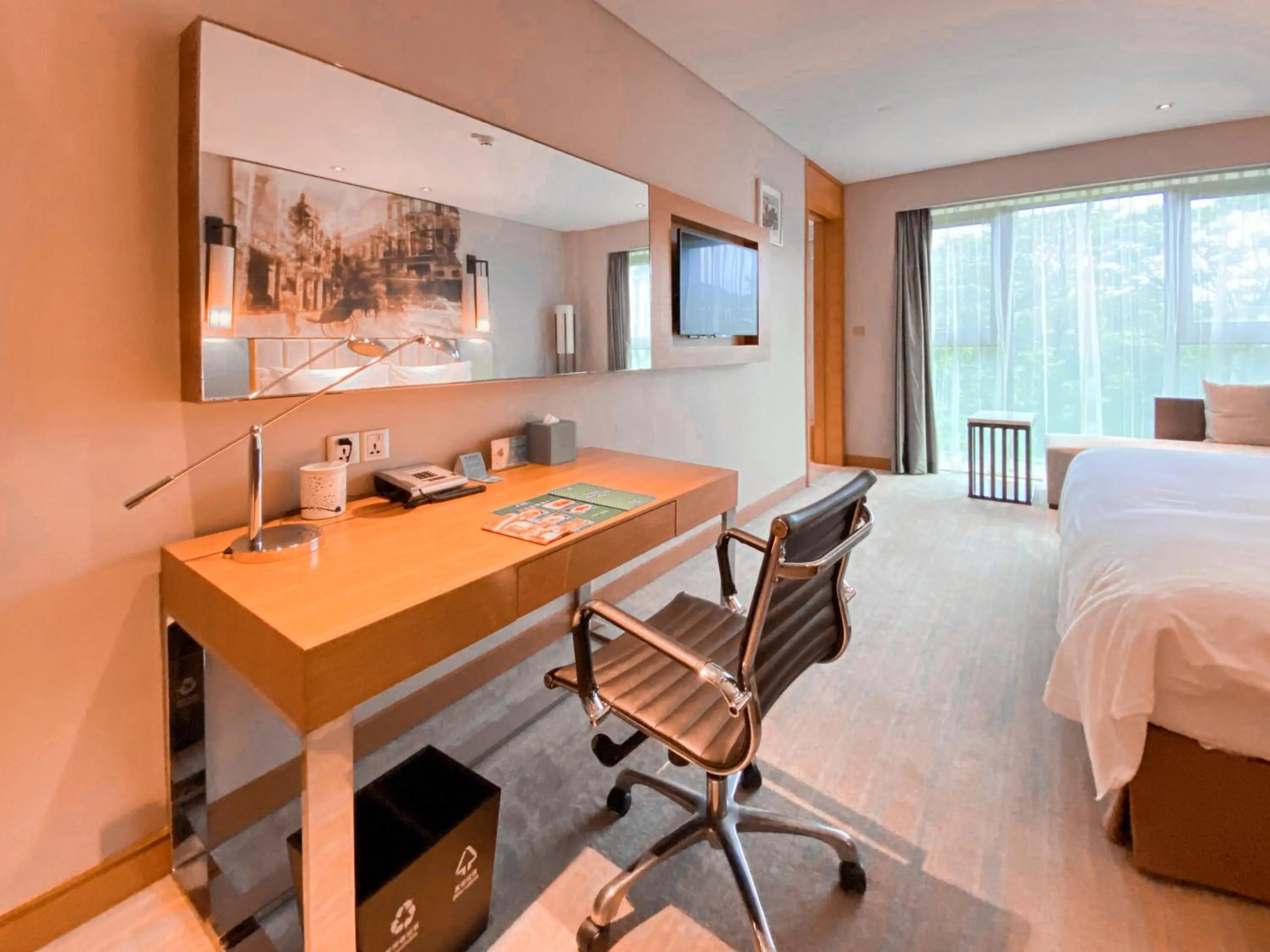 Photo of the whole room in Junluxe Hotel Guangzhou Science City-Free Shuttle Bus Service to Guangzhou Canton Fair